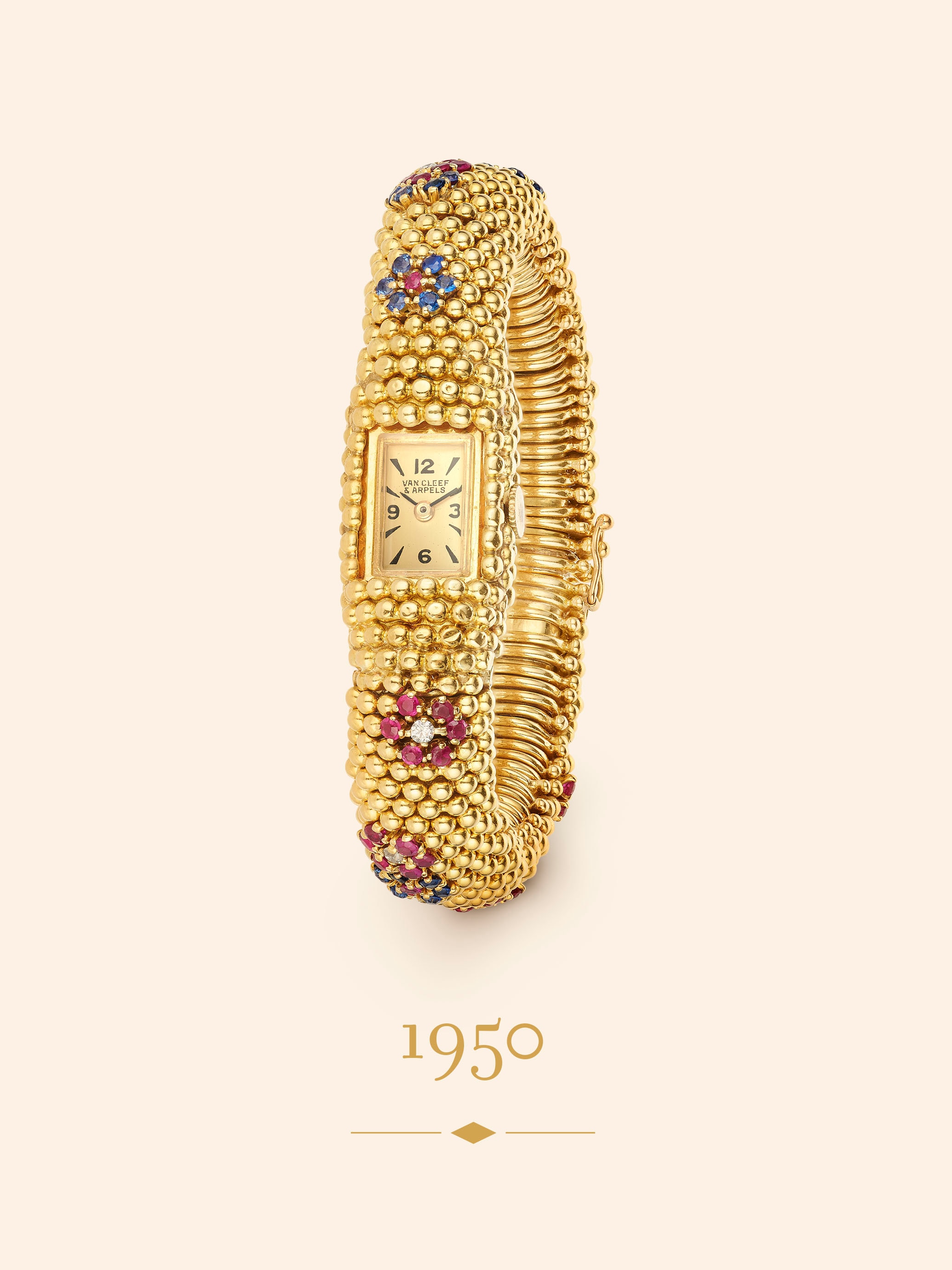 Couscous Bagatelle wristwatch, circa 1950. Yellow gold, rubies, sapphires, diamonds. Van Cleef & Arpels Collection.
