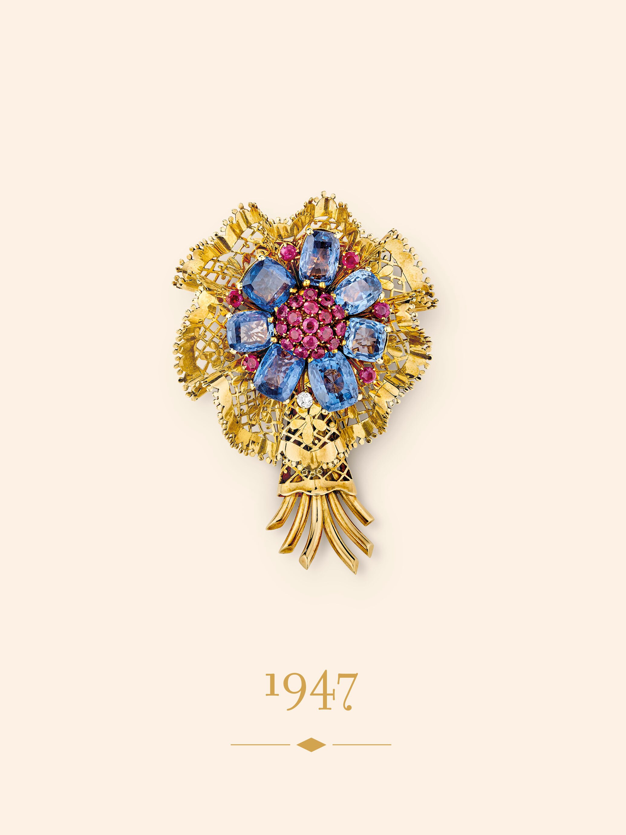 Bouquet Clip, circa 1947. Yellow gold, rose gold, rubies, sapphires, diamond. Van Cleef & Arpels Collection.