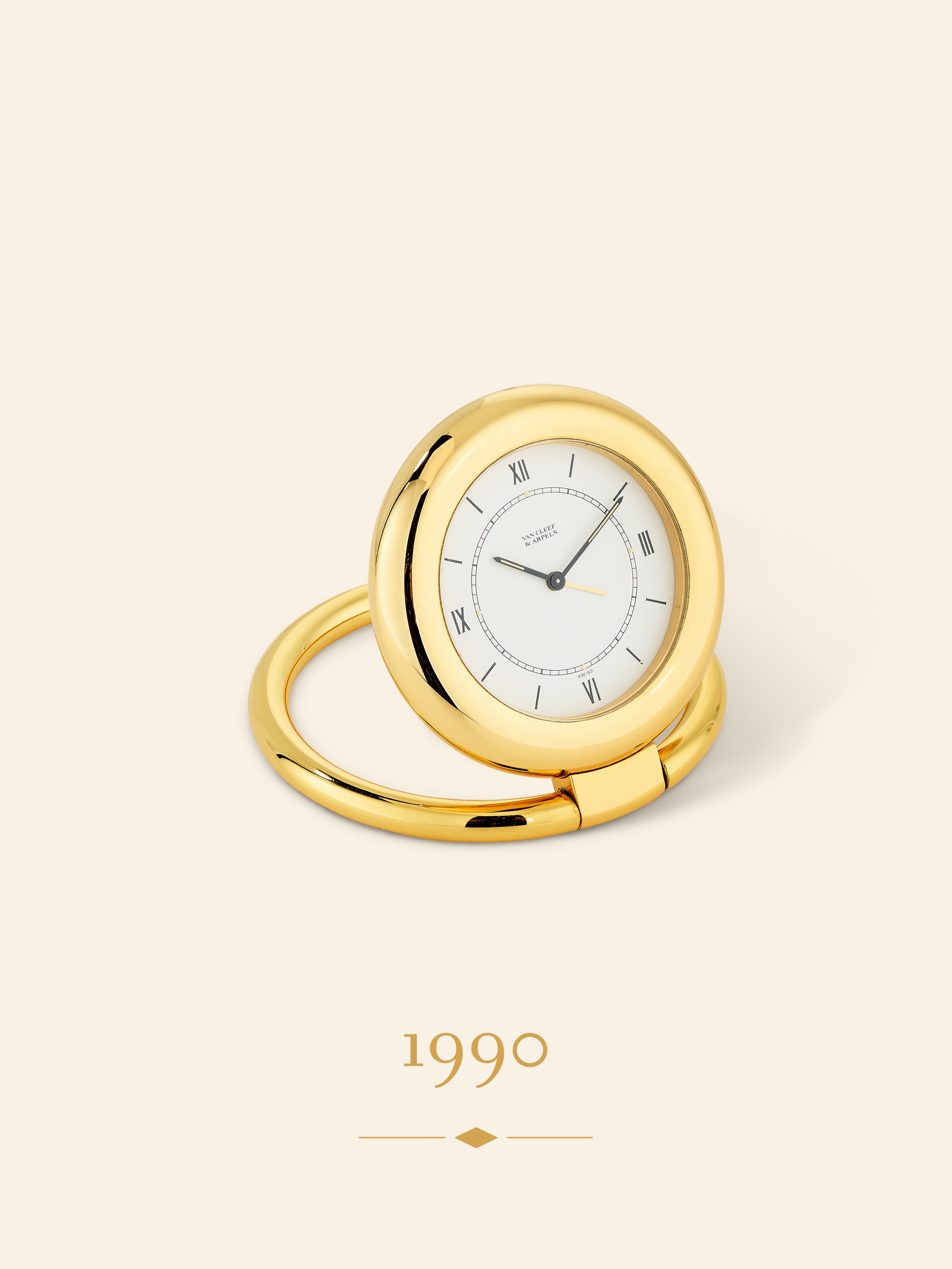 Travel clock, 1990 Brass. Van Cleef & Arpels collection.