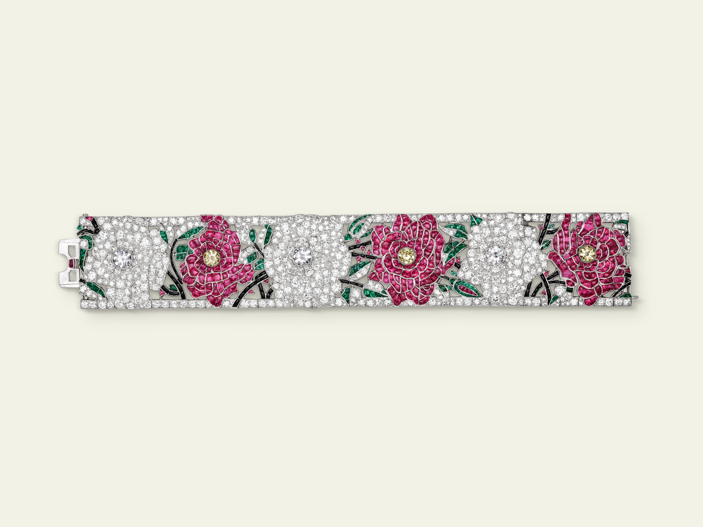 Entwined Flowers, Red and White Roses bracelet, 1924 Platinum, emeralds, rubies, onyx, yellow diamonds, diamonds Van Cleef & Arpels Collection