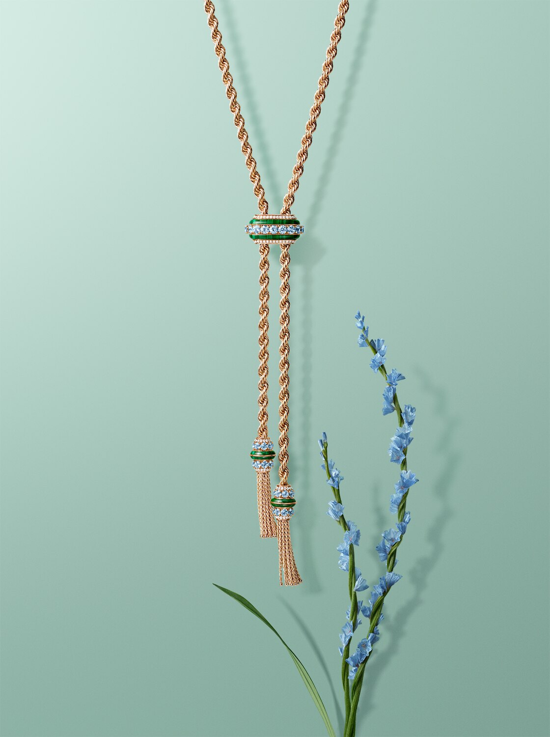 Liane™ long necklace, rose gold, white gold, green tourmalines, lapis lazuli, diamonds. Liane™ collection, Van Cleef & Arpels.