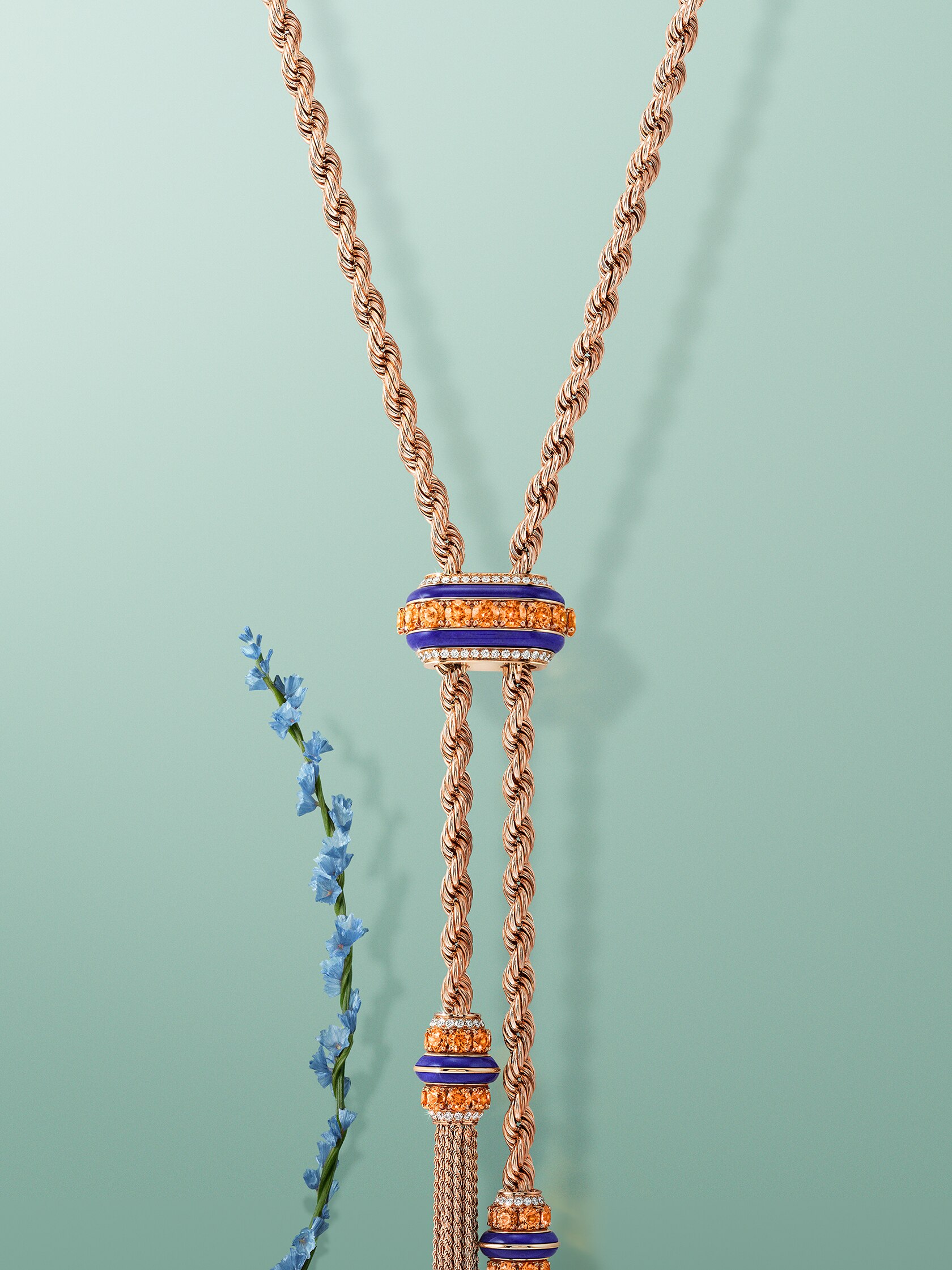 Liane long necklace. 18K rose gold, spessartite garnets, lapis lazuli, diamonds. Liane collection, Van Cleef & Arpels