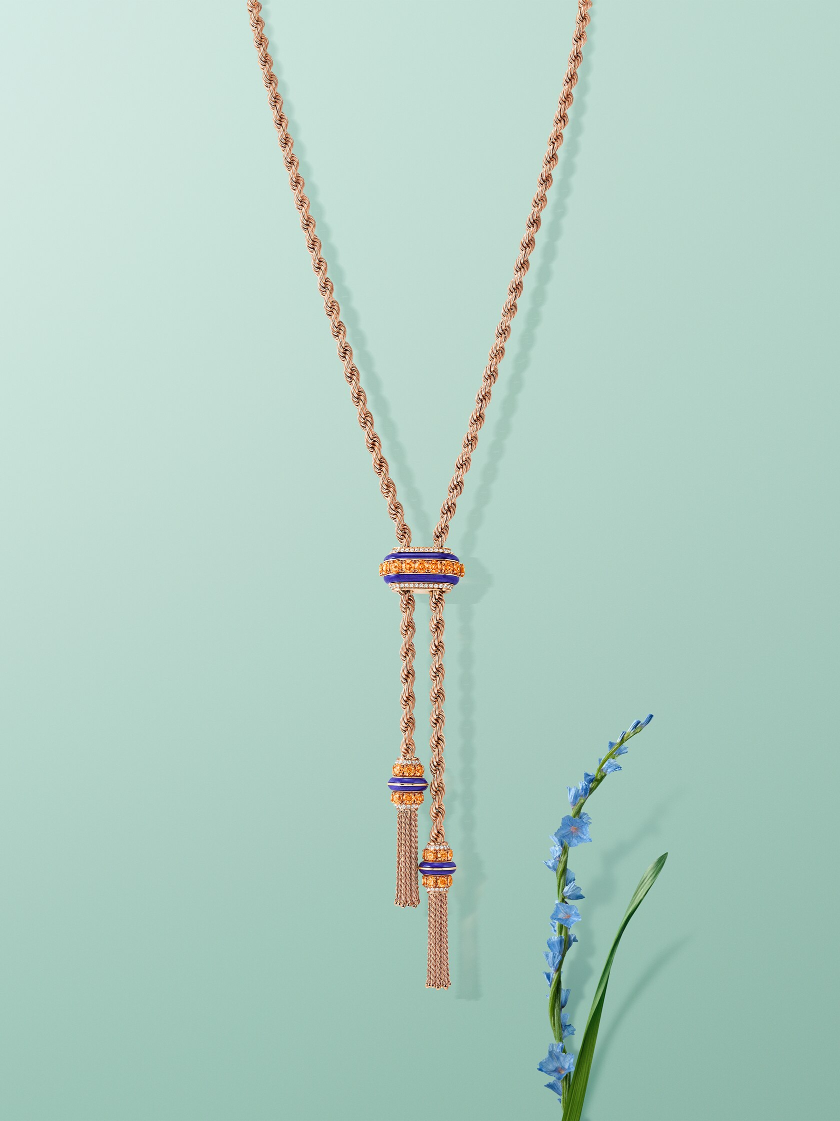 Liane long necklace. 18K rose gold, spessartite garnets, lapis lazuli, diamonds. Liane collection, Van Cleef & Arpels