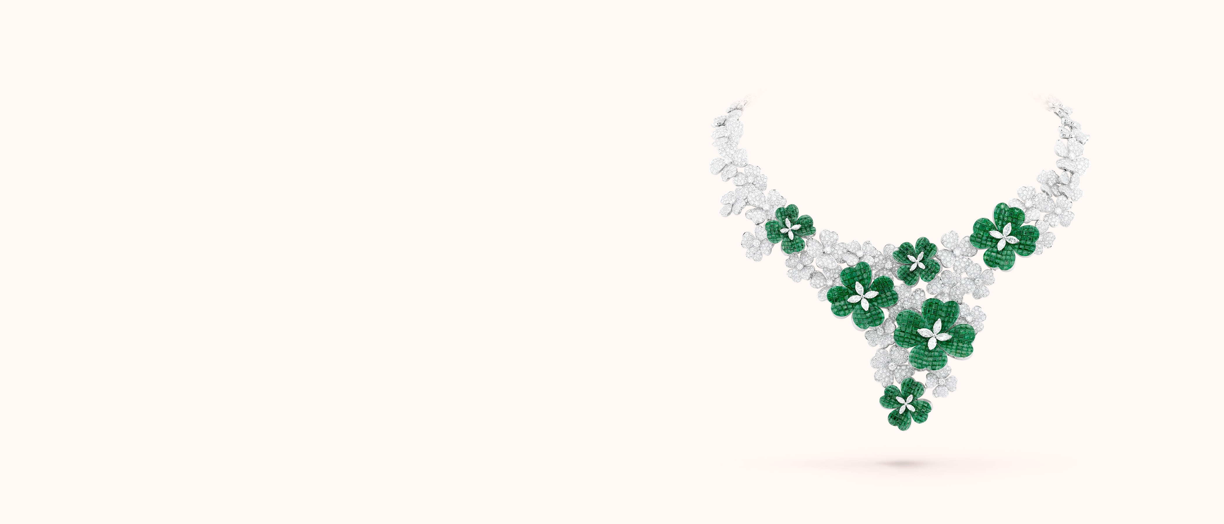 Trèfles Mystérieux necklace. 18K white gold, 18K rose gold, Traditional Mystery Set™ emeralds, diamonds. Private collection.