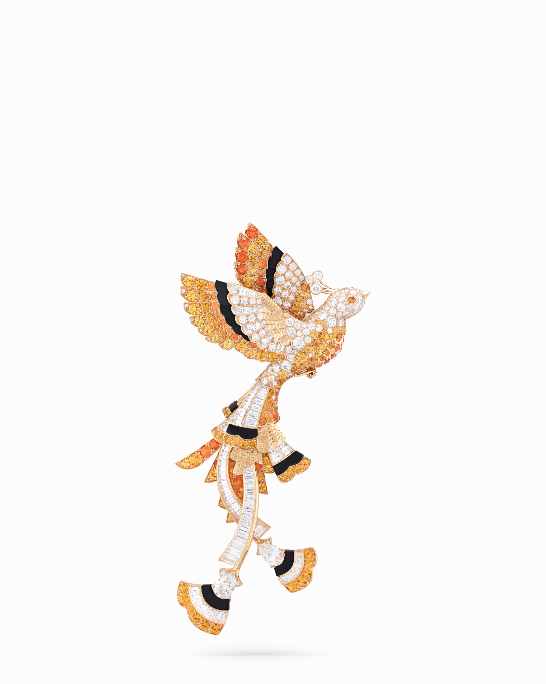 Oiseau d’or clip, yellow gold, two pear-shaped EVVS2 diamonds for 2.02 carats, yellow sapphires, spessartite garnets, onyx, diamonds. Quatre contes de Grimm collection, Van Cleef & Arpels.