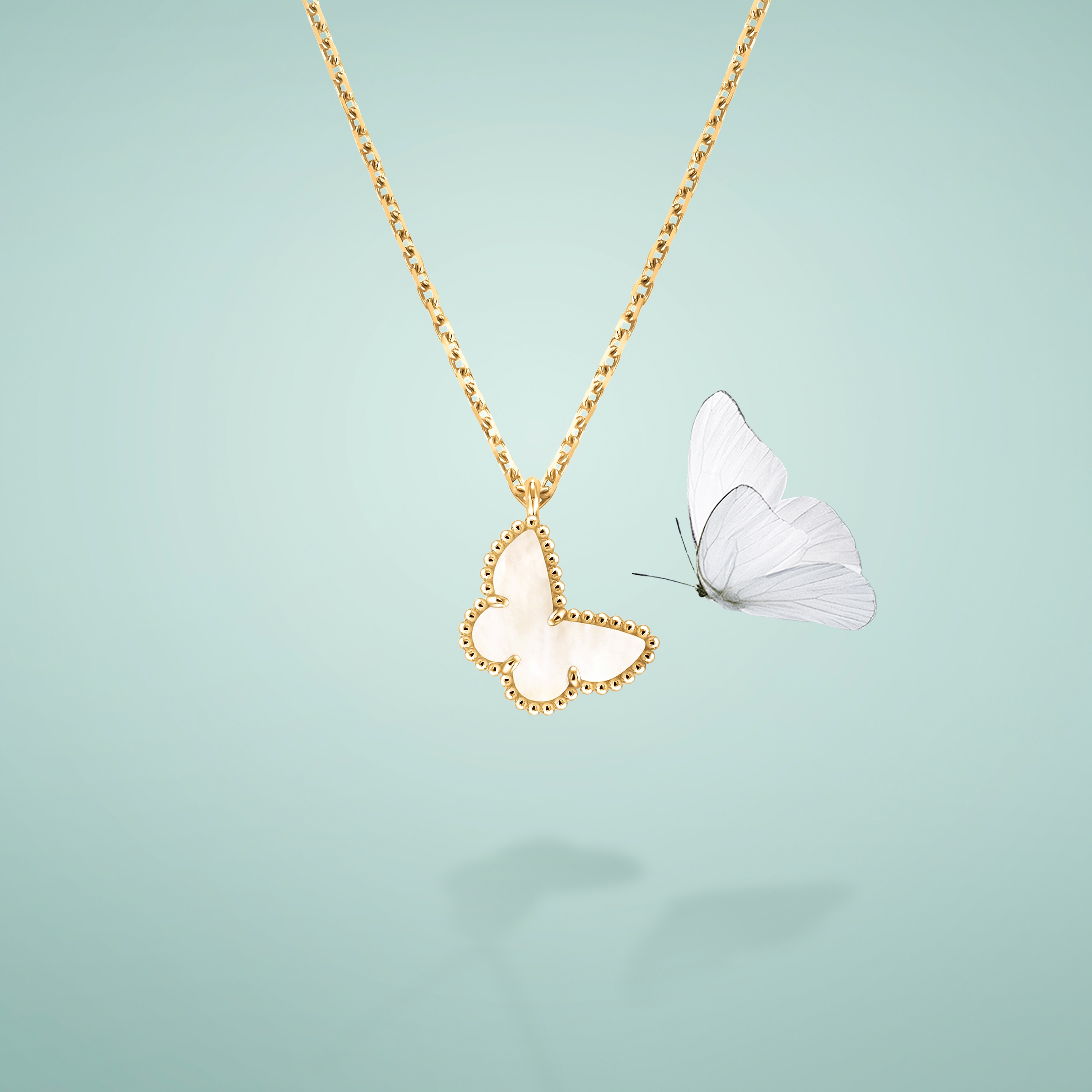 Sweet Butterflies pendant, 18K yellow gold, white mother-of-pearl. Butterflies collection, Van Cleef & Arpels.