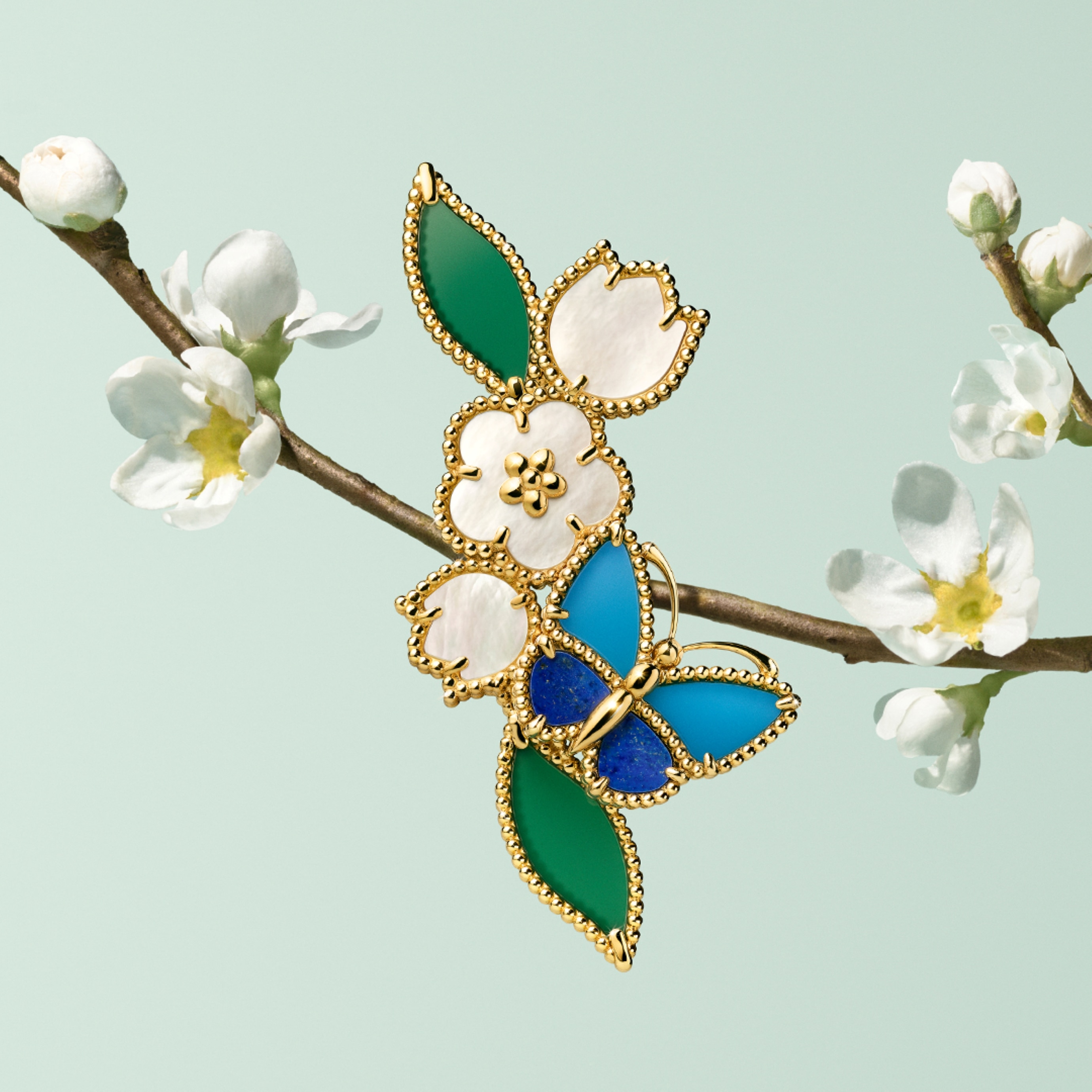 Lucky Spring Butterfly clip, 18K yellow gold, lapis lazuli, blue and green agate, white mother-of-pearl. Lucky Spring® collection, Van Cleef & Arpels.
