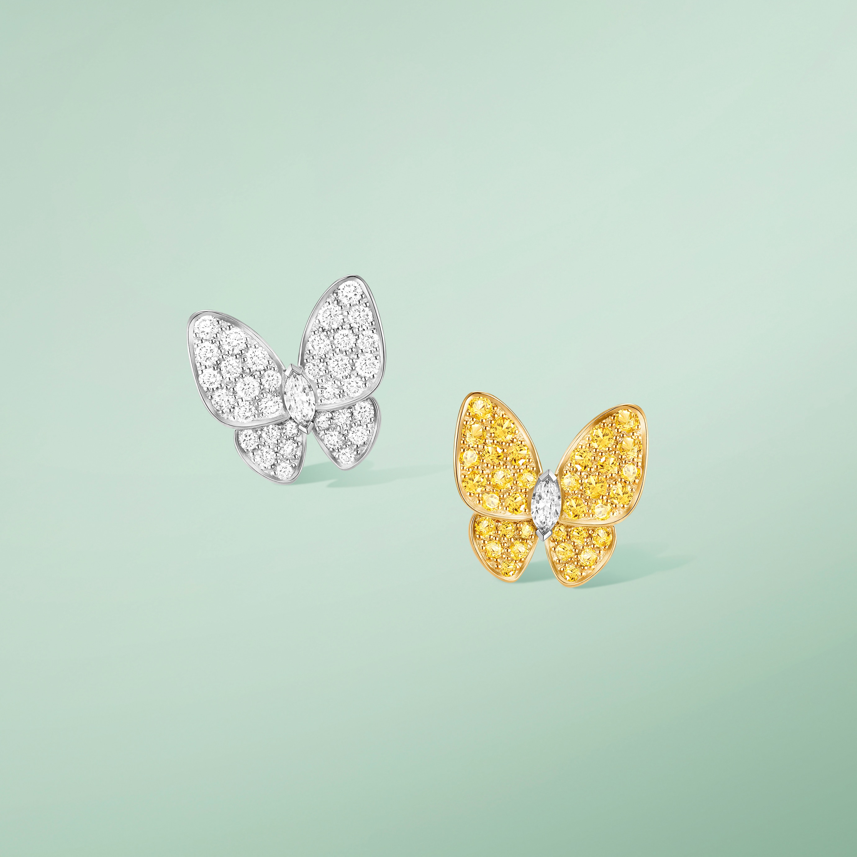 Two Butterfly earrings, 18K yellow gold, yellow sapphires, rhodium plated 18K white gold, diamonds. Two Butterfly collection, Van Cleef & Arpels.