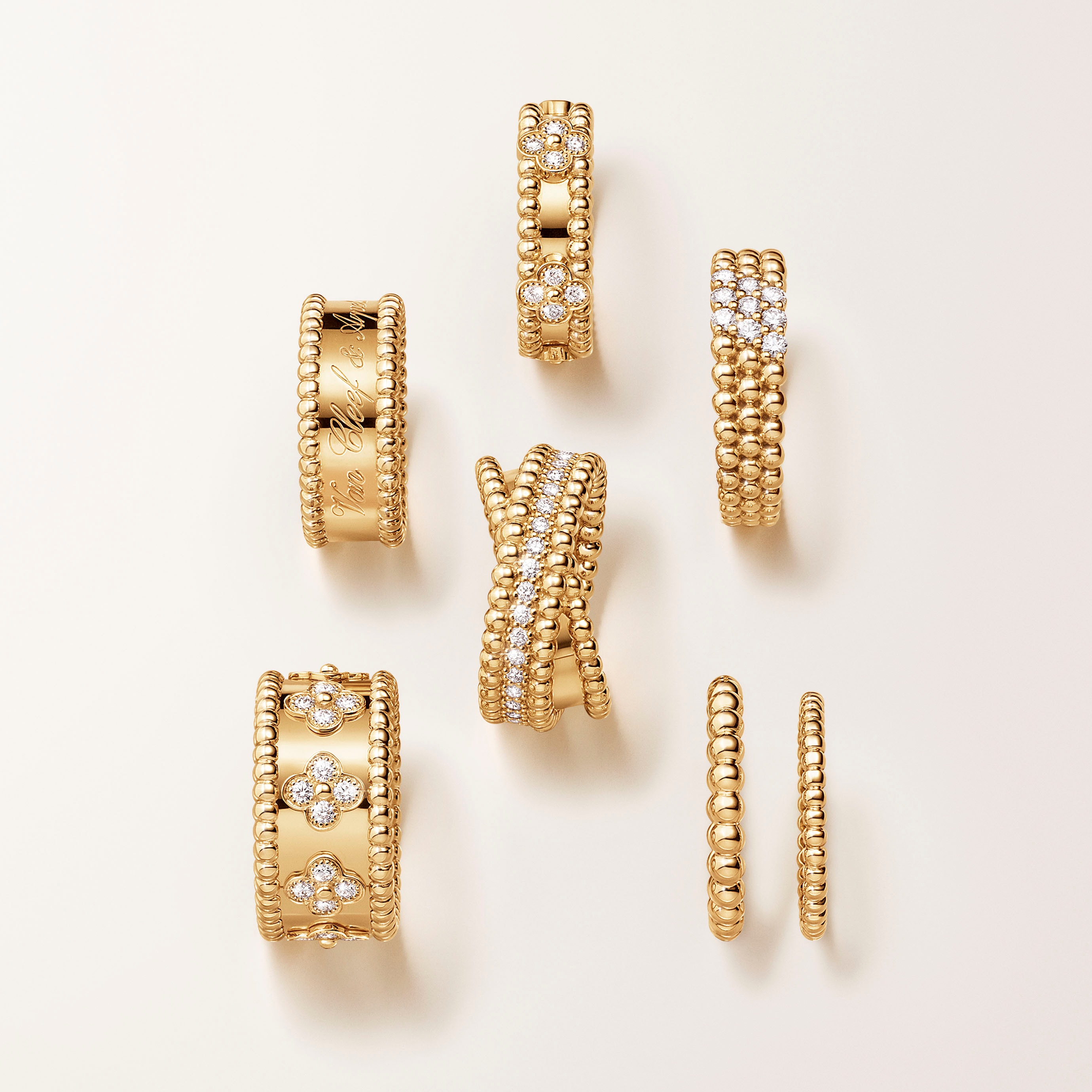 Diamonds ring, 3 rows and diamonds duo ring, 18K yellow gold, diamonds. Perlée collection, Van Cleef & Arpels.