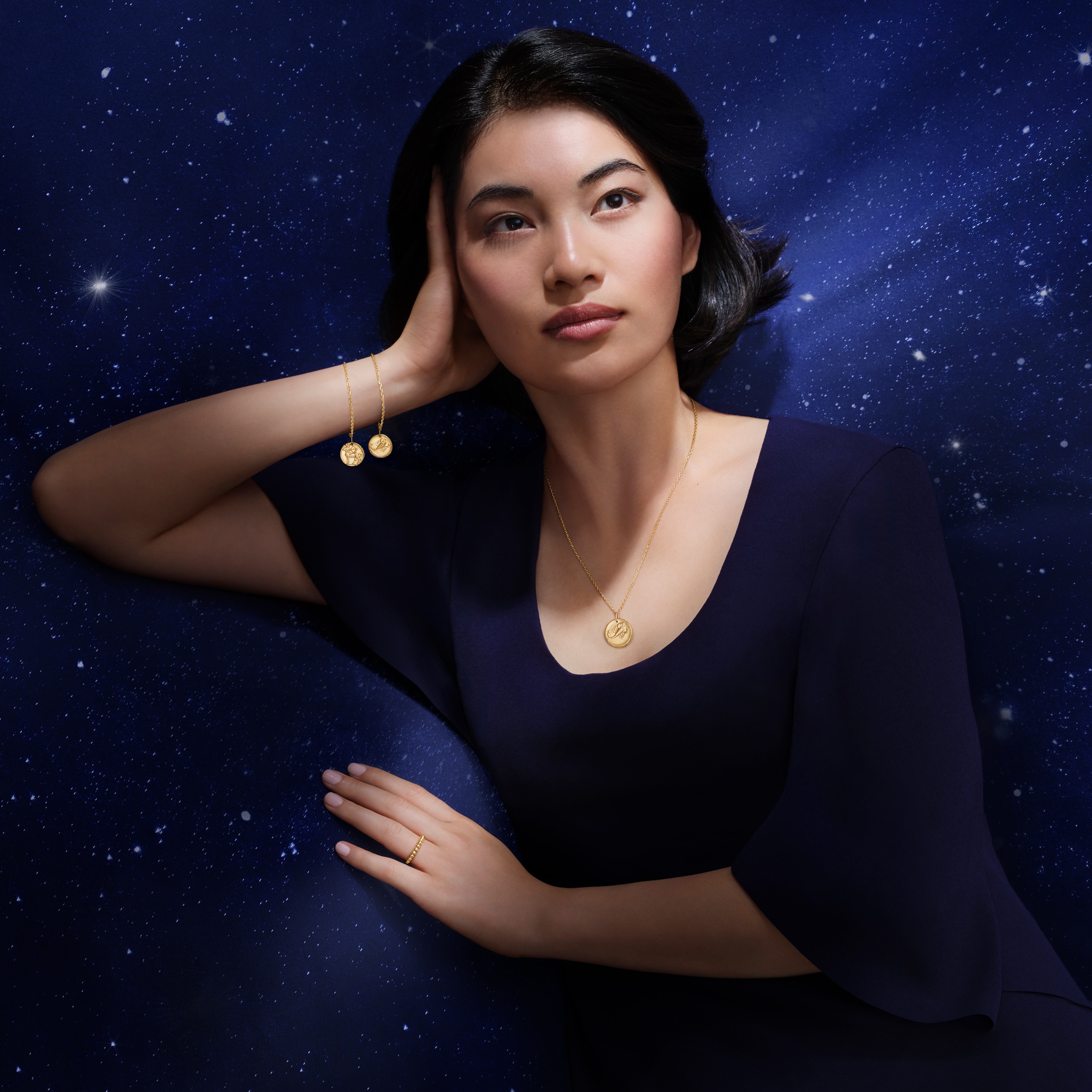 Zodiaque bracelet Sagittarii (Sagittarius), 18K yellow gold. Zodiaque bracelet and medal Scorpii (Scorpio), 18K yellow gold. Zodiaque collection, Van Cleef & Arpels.