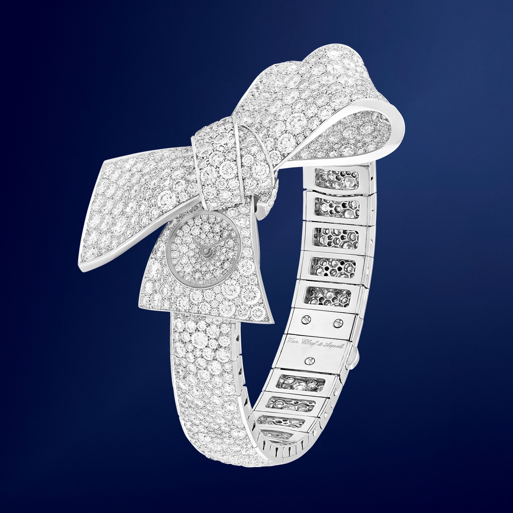 Ruban Secret Watch, rhodium plated 18K white gold, diamonds, quartz movement. High Jewelry watches collection, Van Cleef & Arpels.