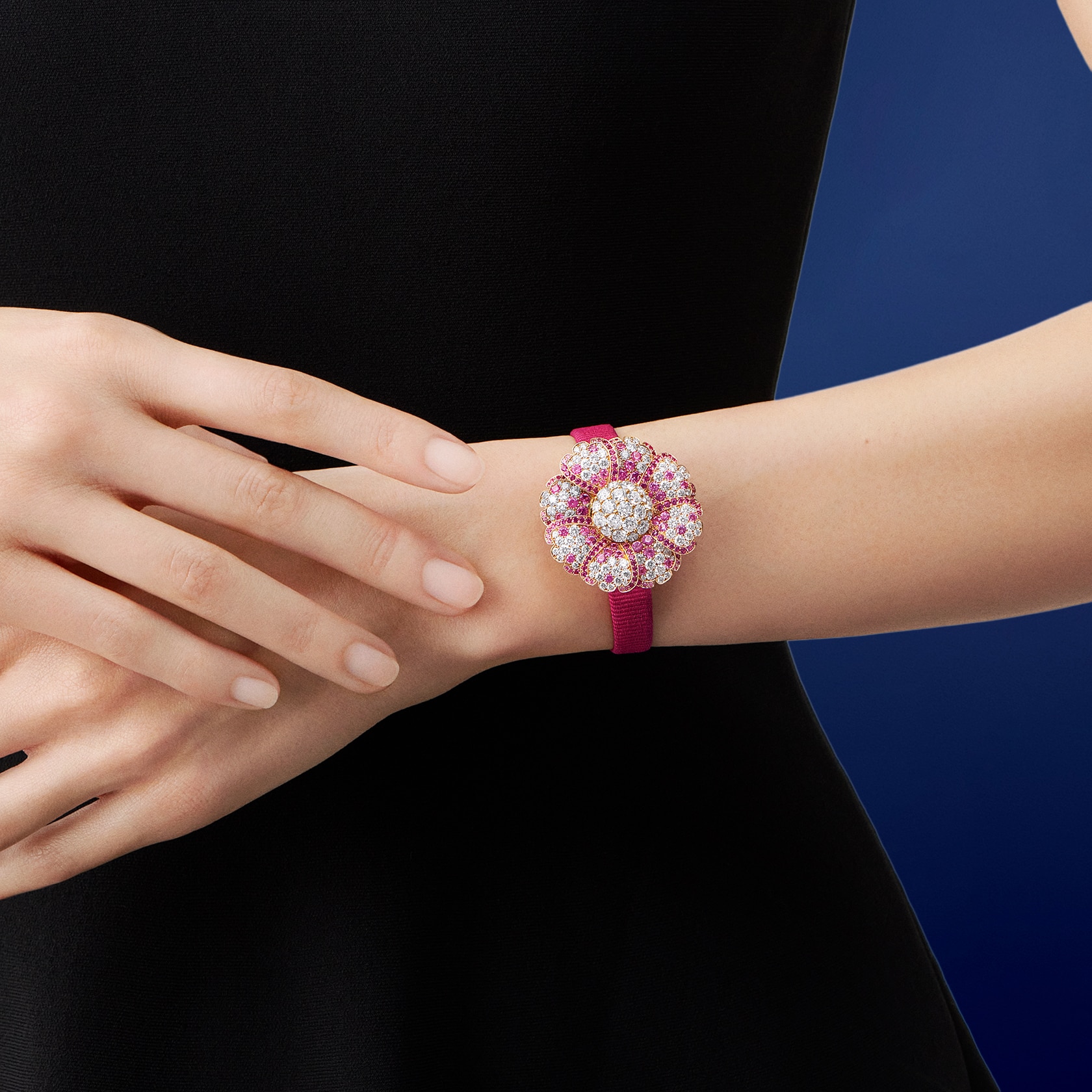 Primerose Secrète watch, 18K rose and 18K yellow gold, diamonds, pink sapphires, quartz movement; 18K yellow and rhodium plated 18K white gold clip, diamonds. High Jewelry watches collection, Van Cleef & Arpels.