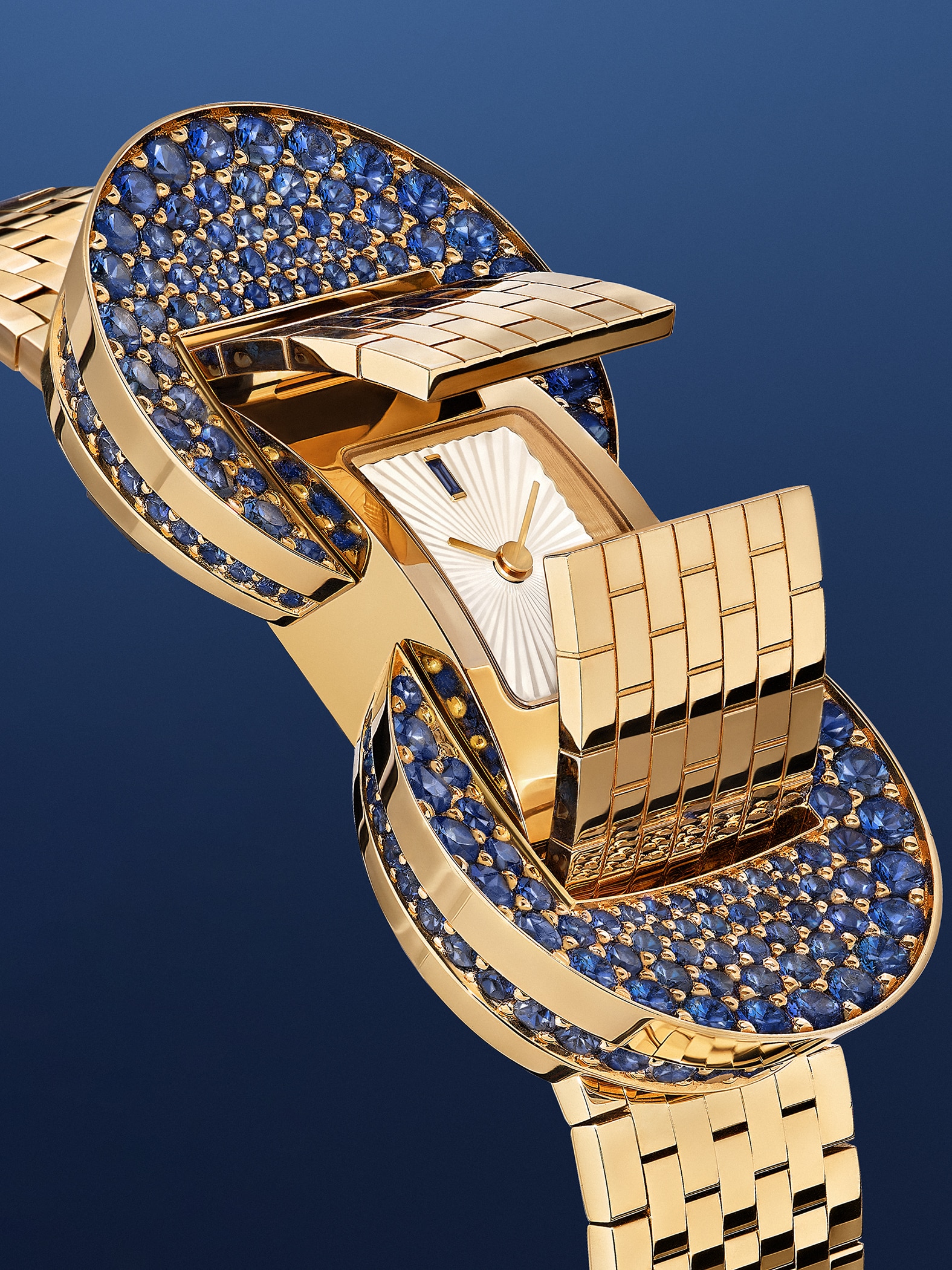 Ludo Secret watch, yellow gold, sapphires, white mother-of-pearl, Swiss quartz movement. Ludo collection, Van Cleef & Arpels.