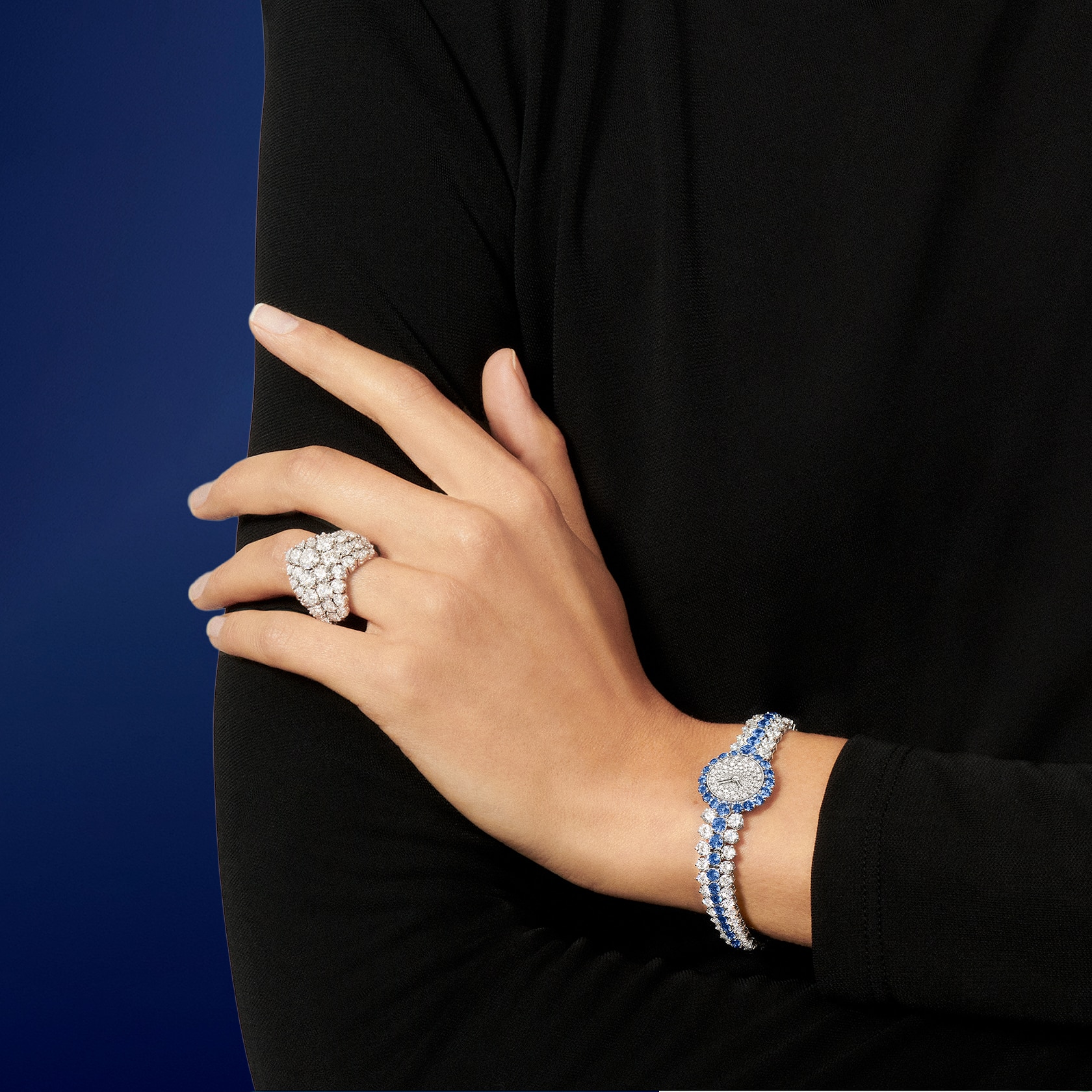 À Cheval watch, platinum, rhodium plated 18K white gold, sapphires, diamonds, Swiss quartz movement. À Cheval ring. 18K rose gold, diamonds. À cheval collection, Van Cleef & Arpels.