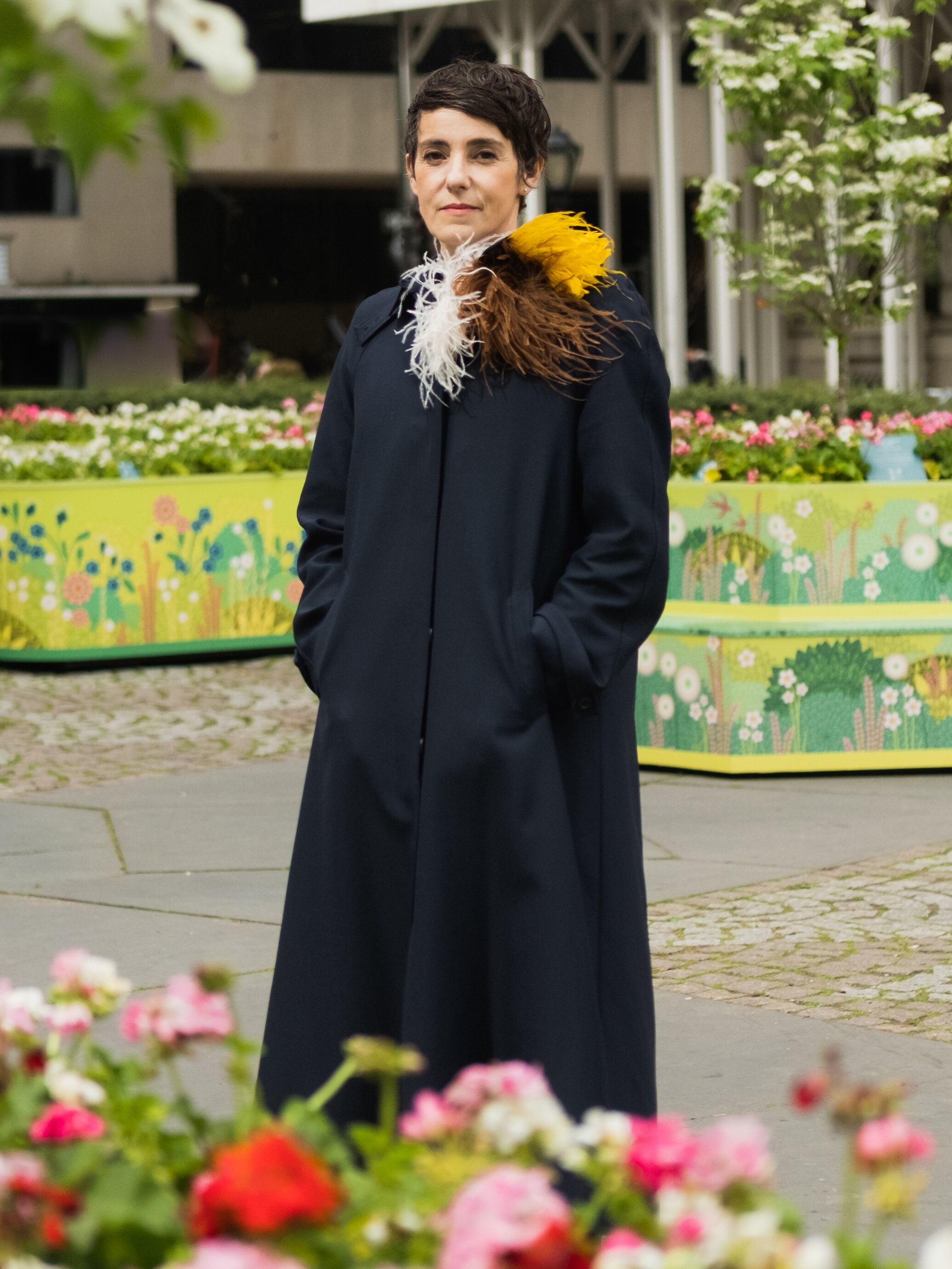 Artist Charlotte Gastaut in front of her creations. Van Cleef & Arpels.