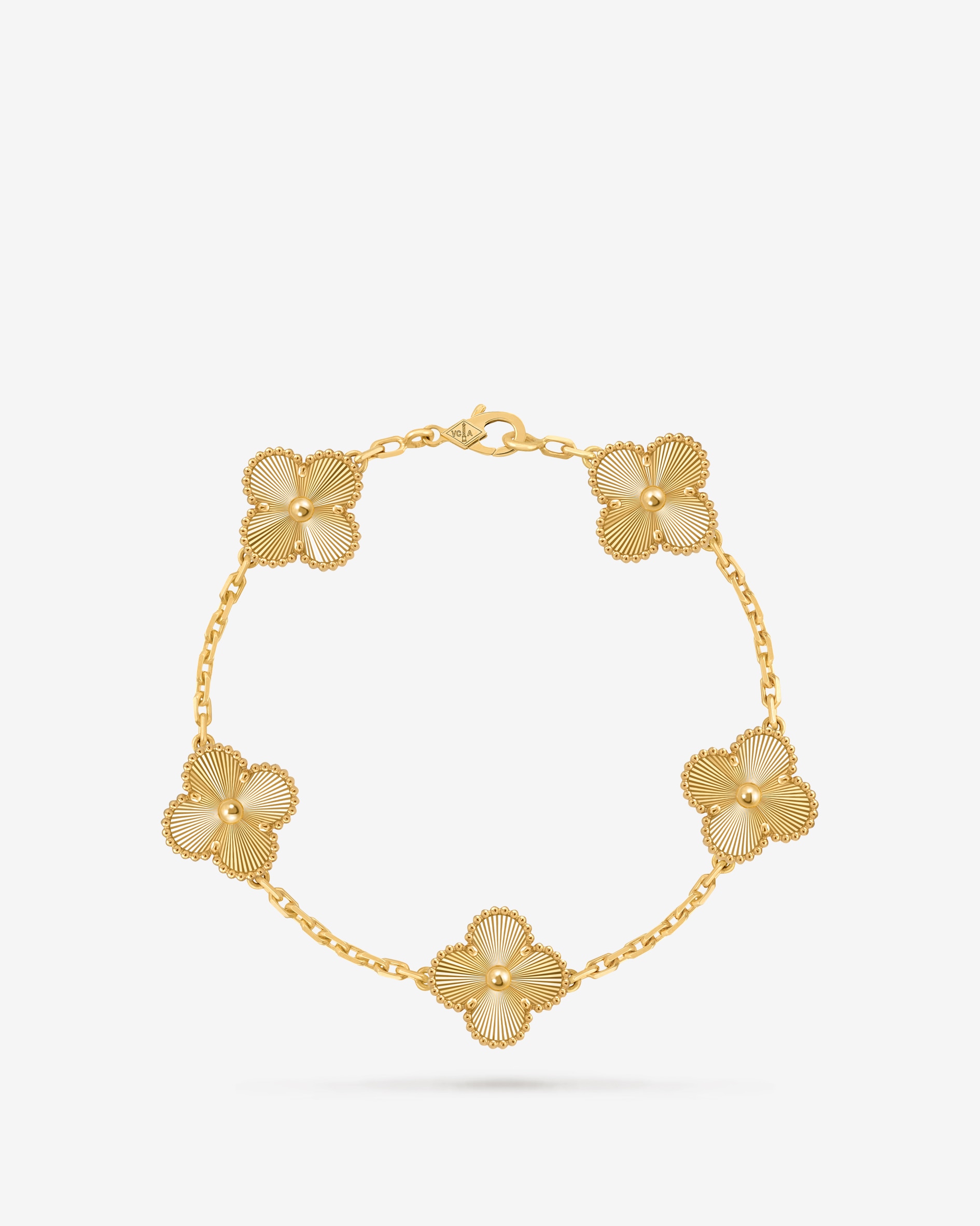 Vintage Alhambra bracelet, 5 motifs, 18K yellow gold. Alhambra® collection, Van Cleef & Arpels.