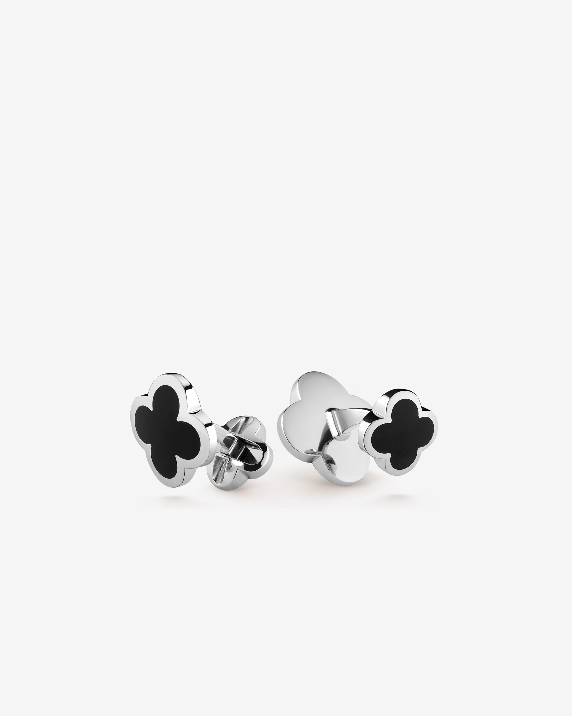 Alhambra cufflinks, 18K white gold, onyx. Alhambra® collection, Van Cleef & Arpels.