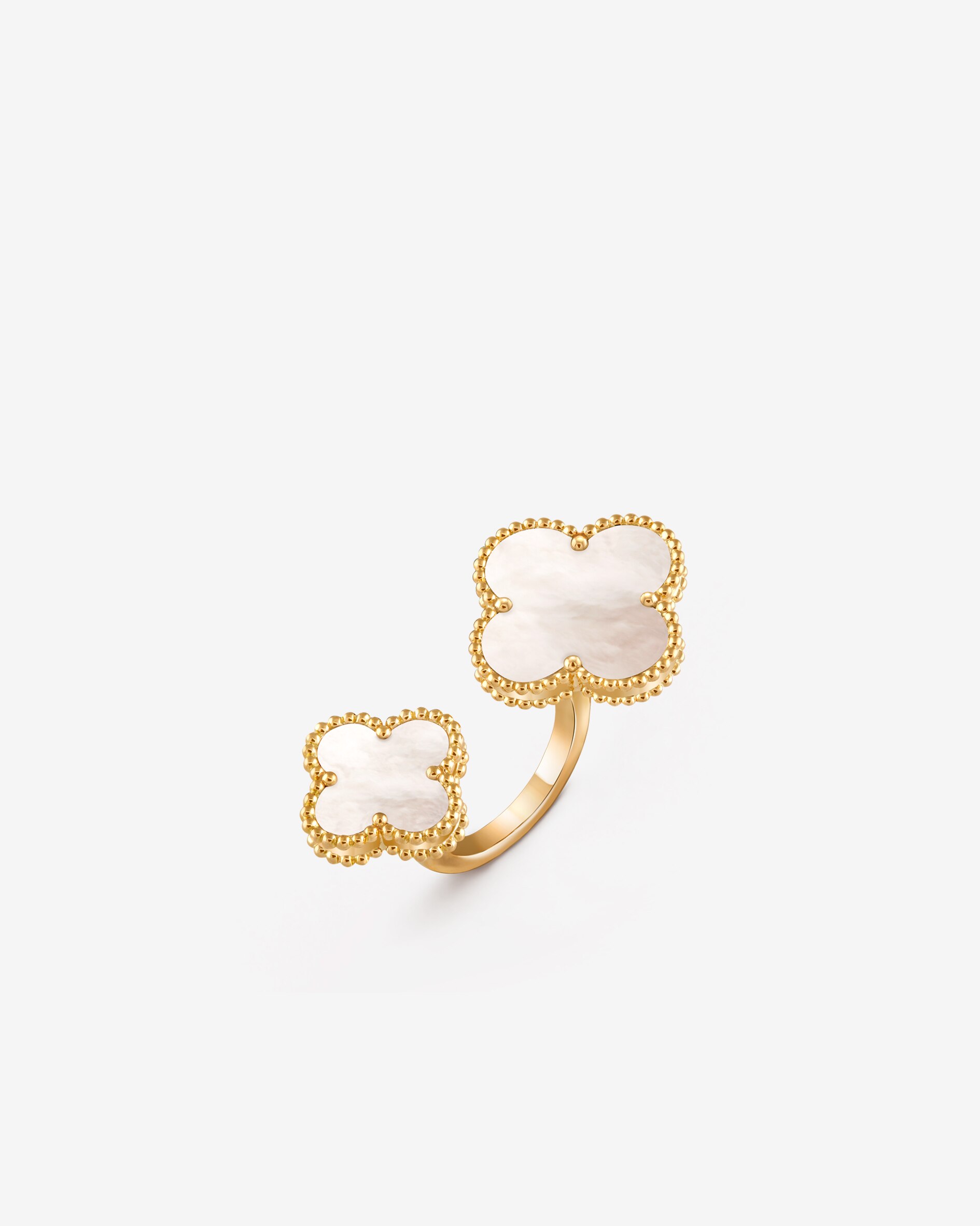Magic Alhambra Between the Finger ring, 18K yellow gold, mother-of-pearl. Alhambra Collection, Van Cleef & Arpels.