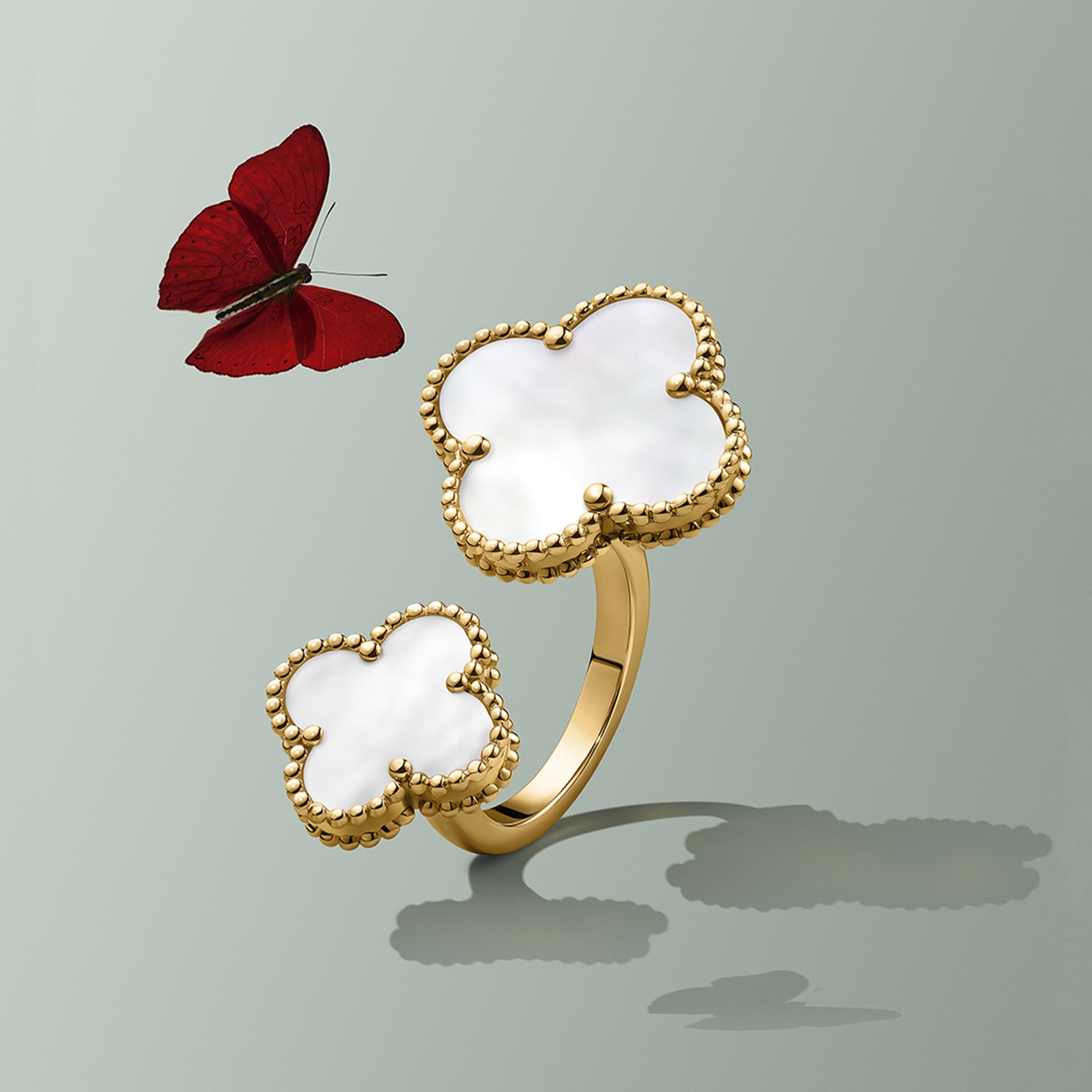 Magic Alhambra Between the Finger ring, 18K yellow gold, mother-of-pearl. Alhambra® collection, Van Cleef & Arpels.