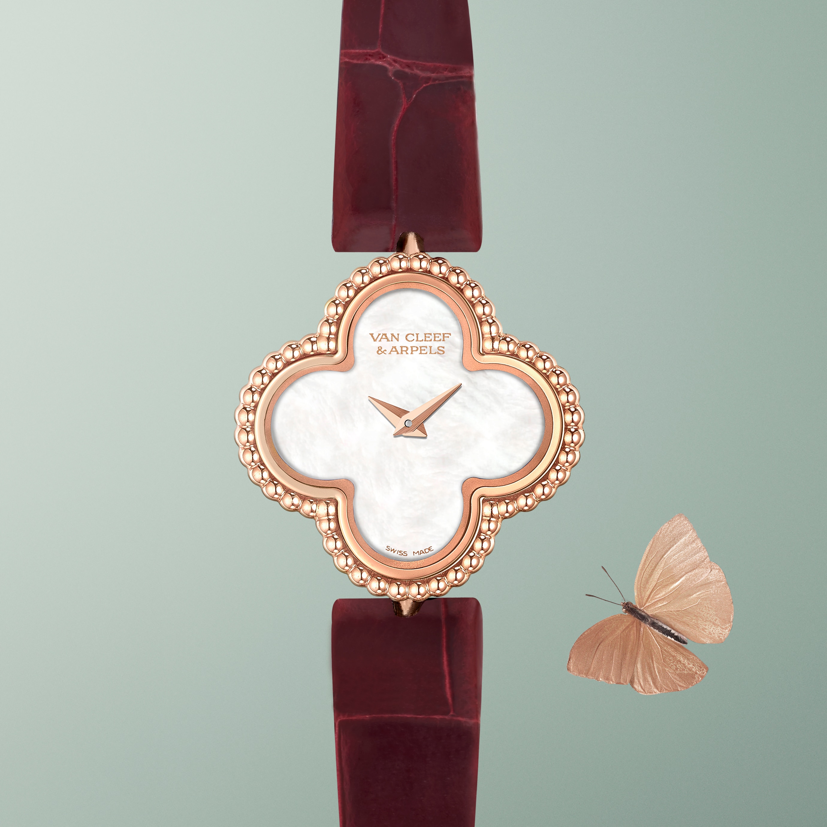 Sweet Alhambra watch, pendant watch, 18K rose gold, mother-of-pearl, diamonds. Alhambra® collection, Van Cleef & Arpels.