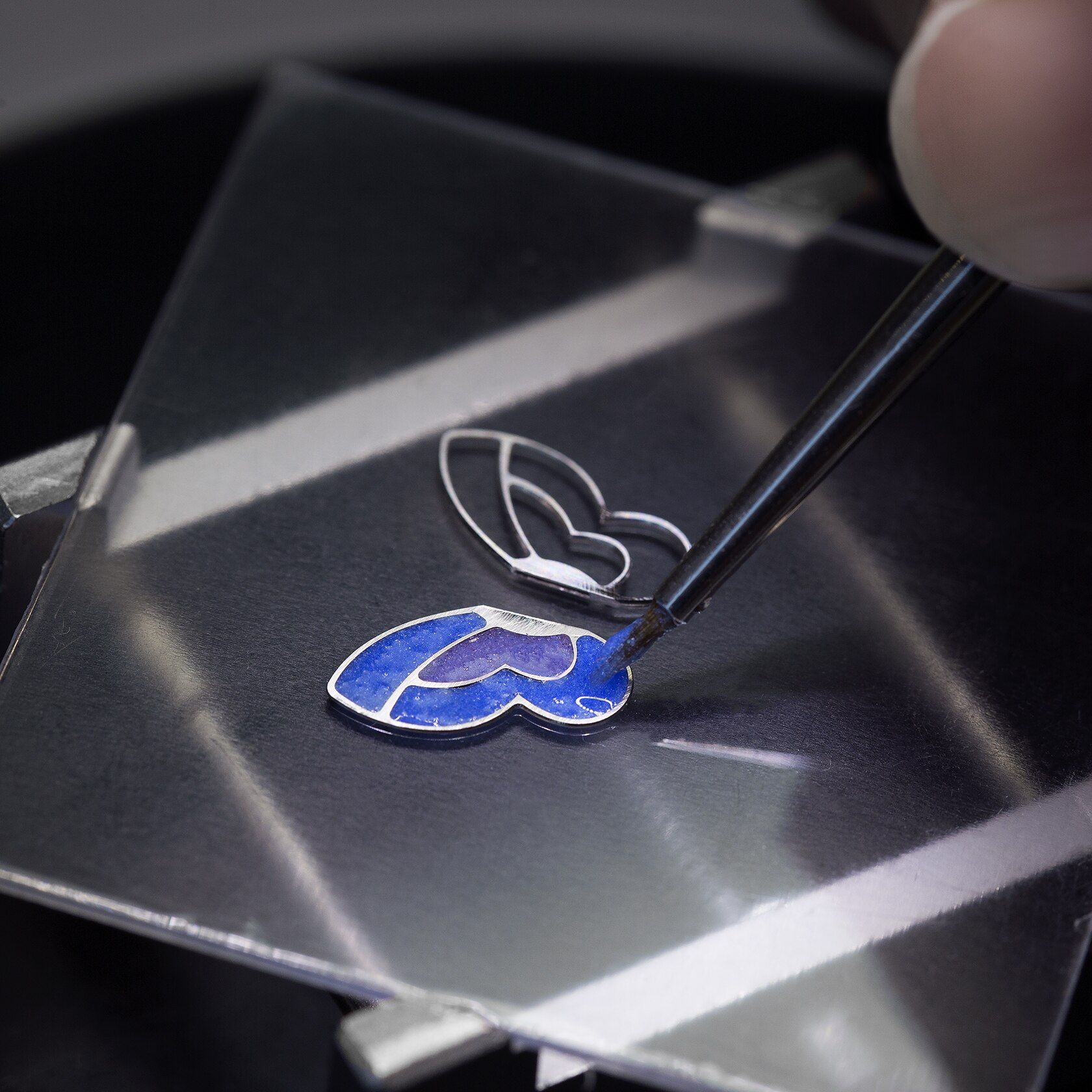 Creation of the butterfly with the plique-à-jour enamel technic. Van Cleef & Arpels