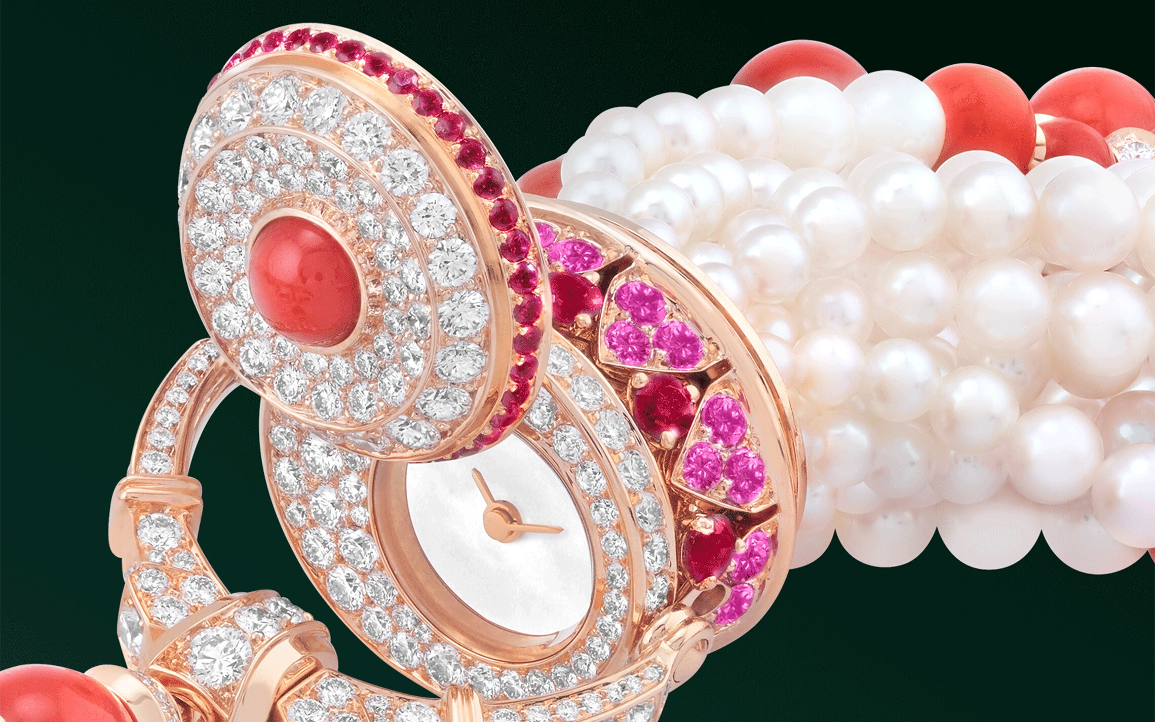 Pompon Gaia transformable long necklace watch 18K rose gold, pink sapphires, rubies, coral, white cultured pearls, white mother-of-pearl, diamonds, swiss quartz movement. Van Cleef & Arpels.