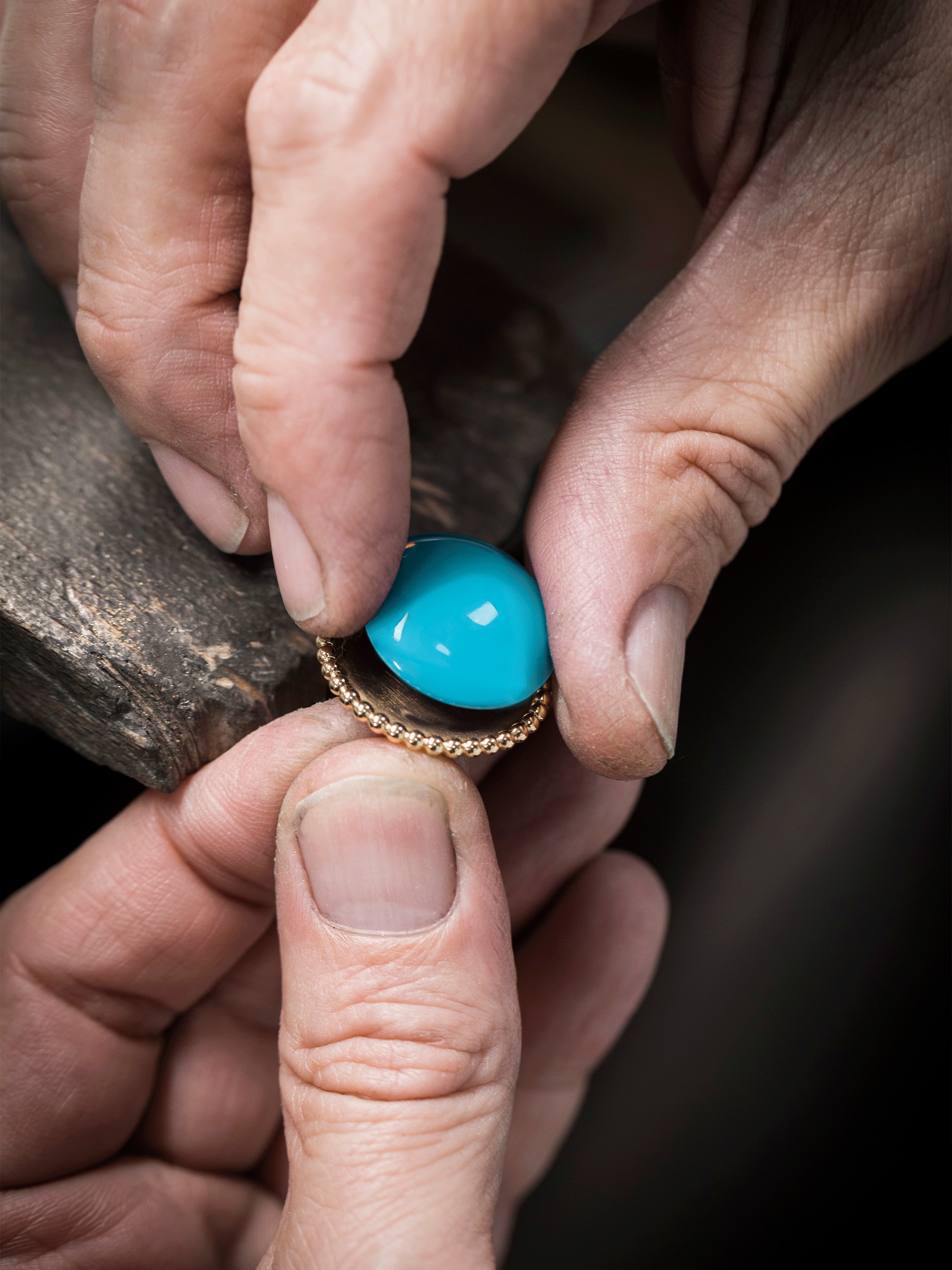 Assembling of the turquoise stone on the gold structure. Perlée collection, Van Cleef & Arpels.