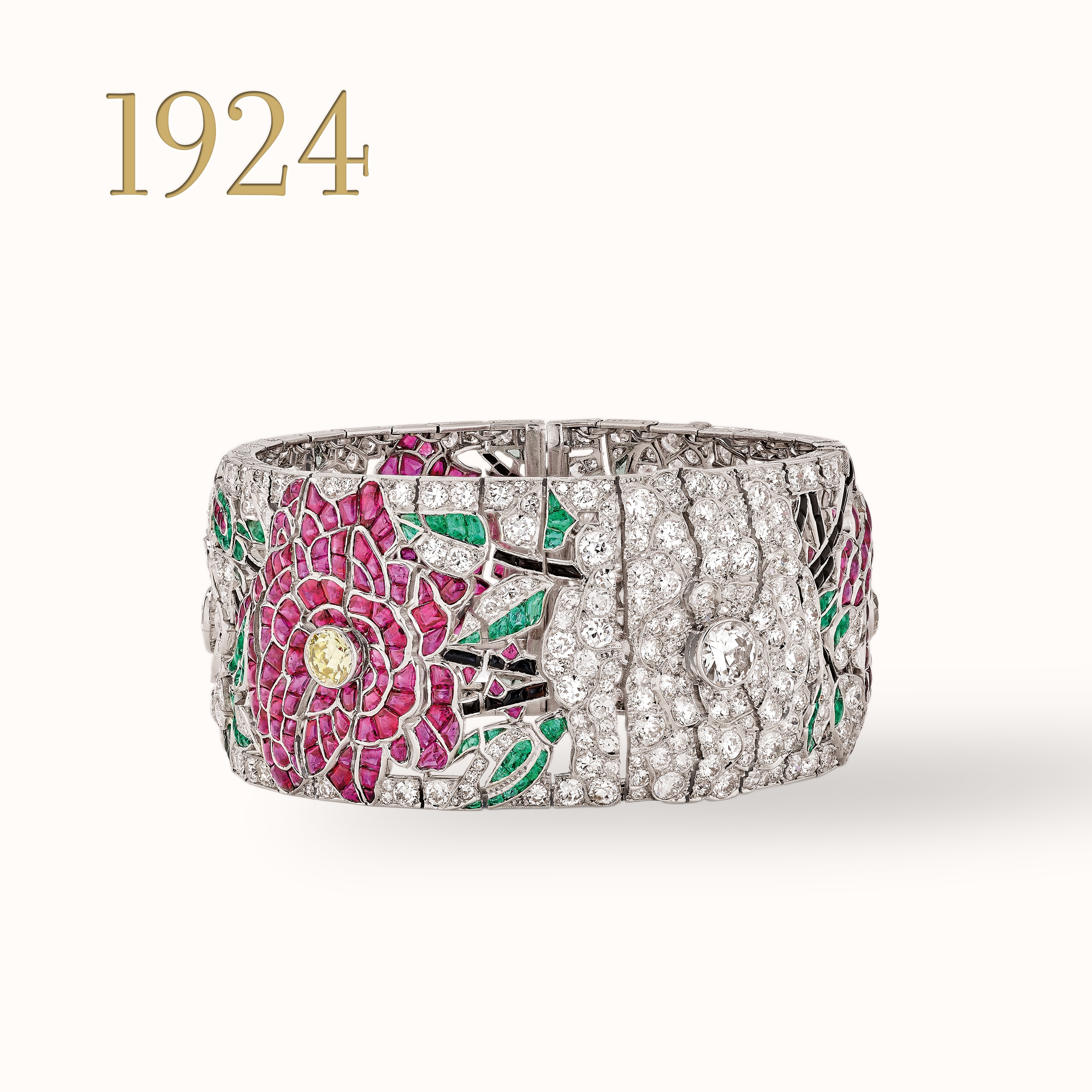 Entwined Flowers, red and white roses bracelet, platinum, emeralds, rubies, onyx, yellow diamonds, diamonds. Van Cleef & Arpels collection.
