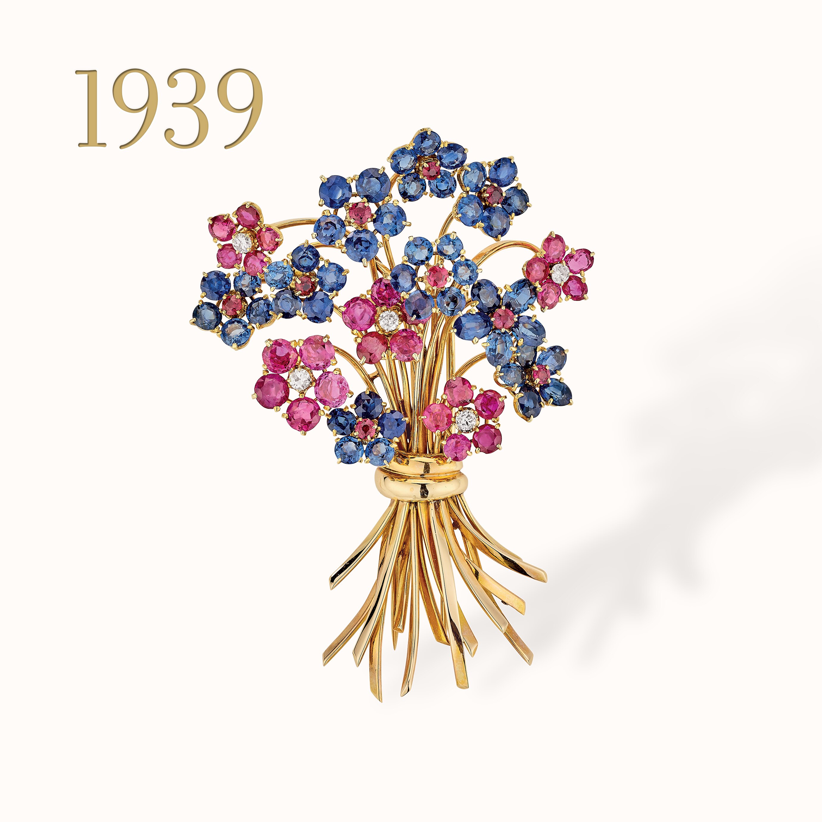 Hawaii bouquet clip, yellow gold, rubies, sapphires, diamonds. Van Cleef & Arpels collection.