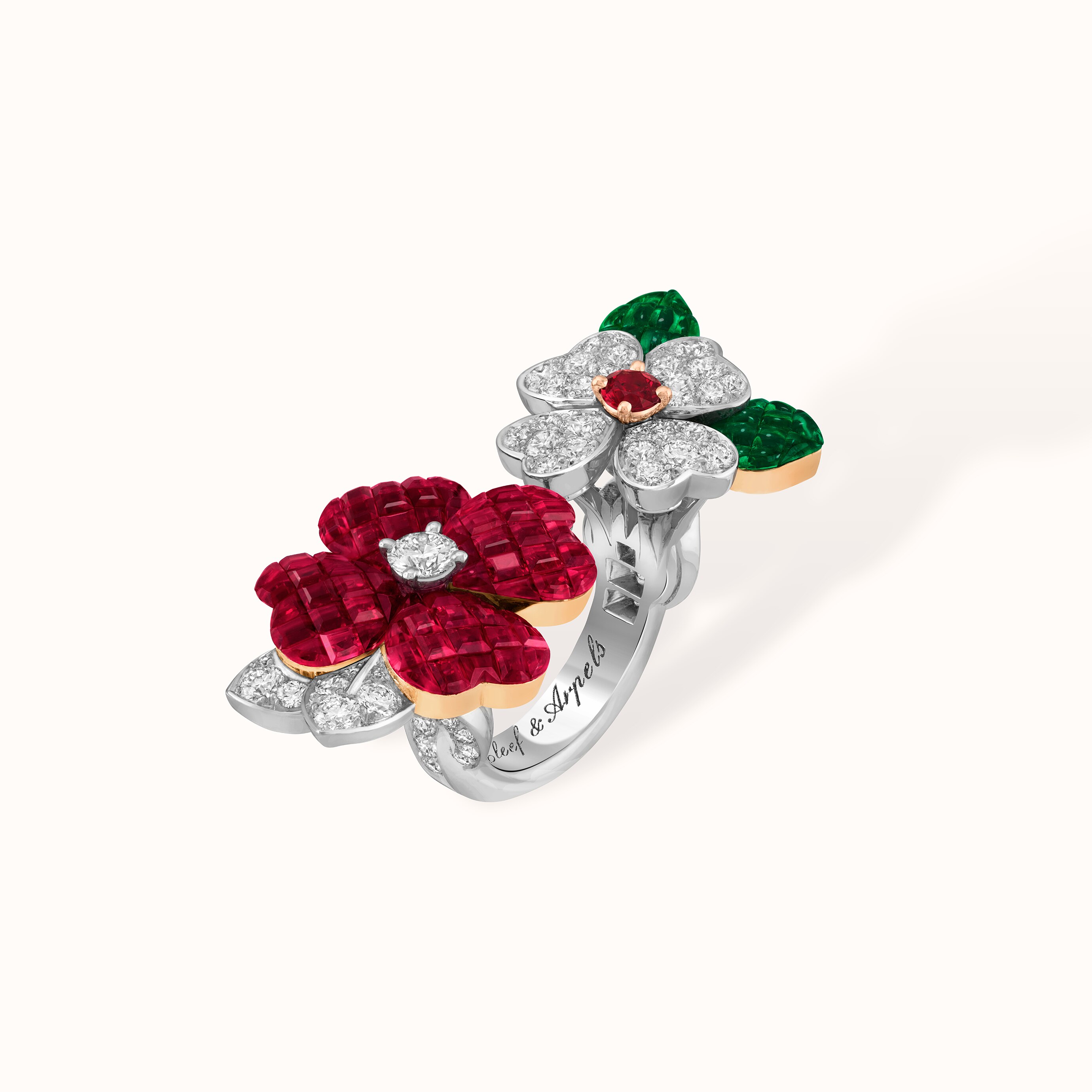 Cosmos Between the Finger Rings™, 18K white gold, 18K rose gold, Traditional Mystery Set rubies and emeralds, ruby, diamonds. Signatures collection, Van Cleef & Arpels.