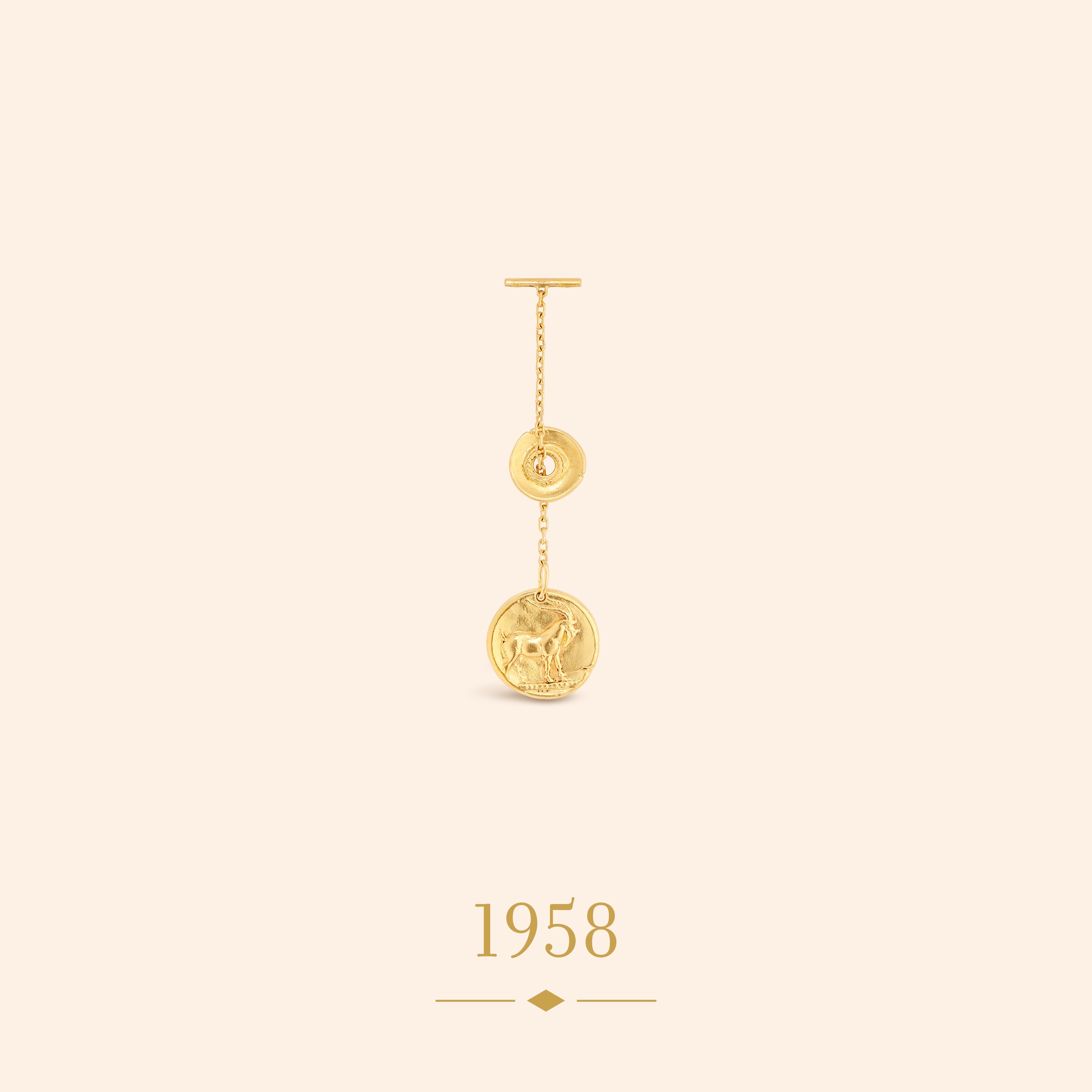 Key chain with Capricorn medal, 1958 Yellow gold Van Cleef & Arpels Collection