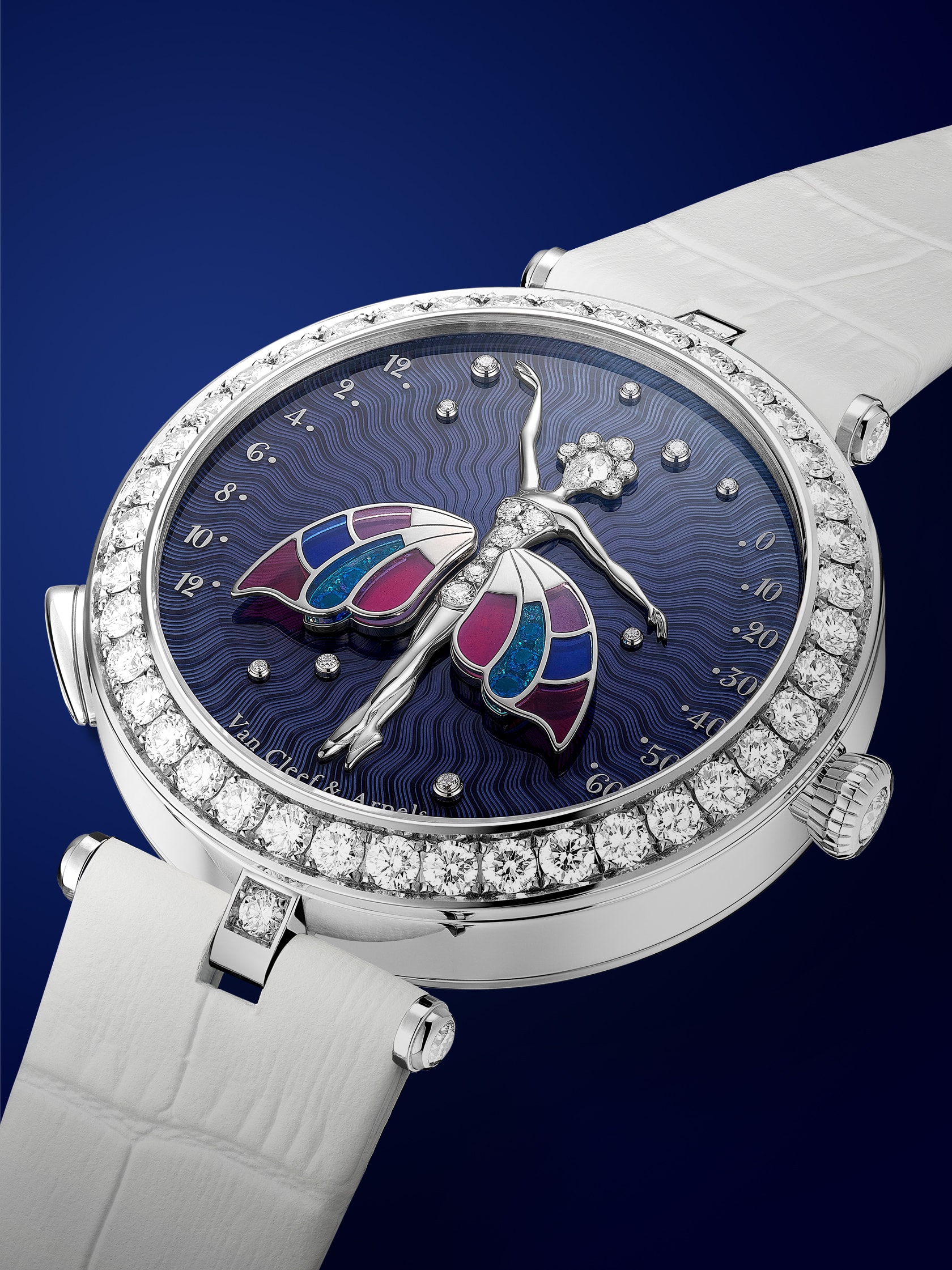 Lady Arpels Ballerine Enchantée watch, rhodium plated 18K white gold, diamonds, sapphires, enamel, self-winding mechanical movement equipped with a retrograde time on demand module. Watch sold with two interchangeable straps and one interchangeable pin buckle set with diamonds. Poetic Complications Collection, Van Cleef & Arpels.