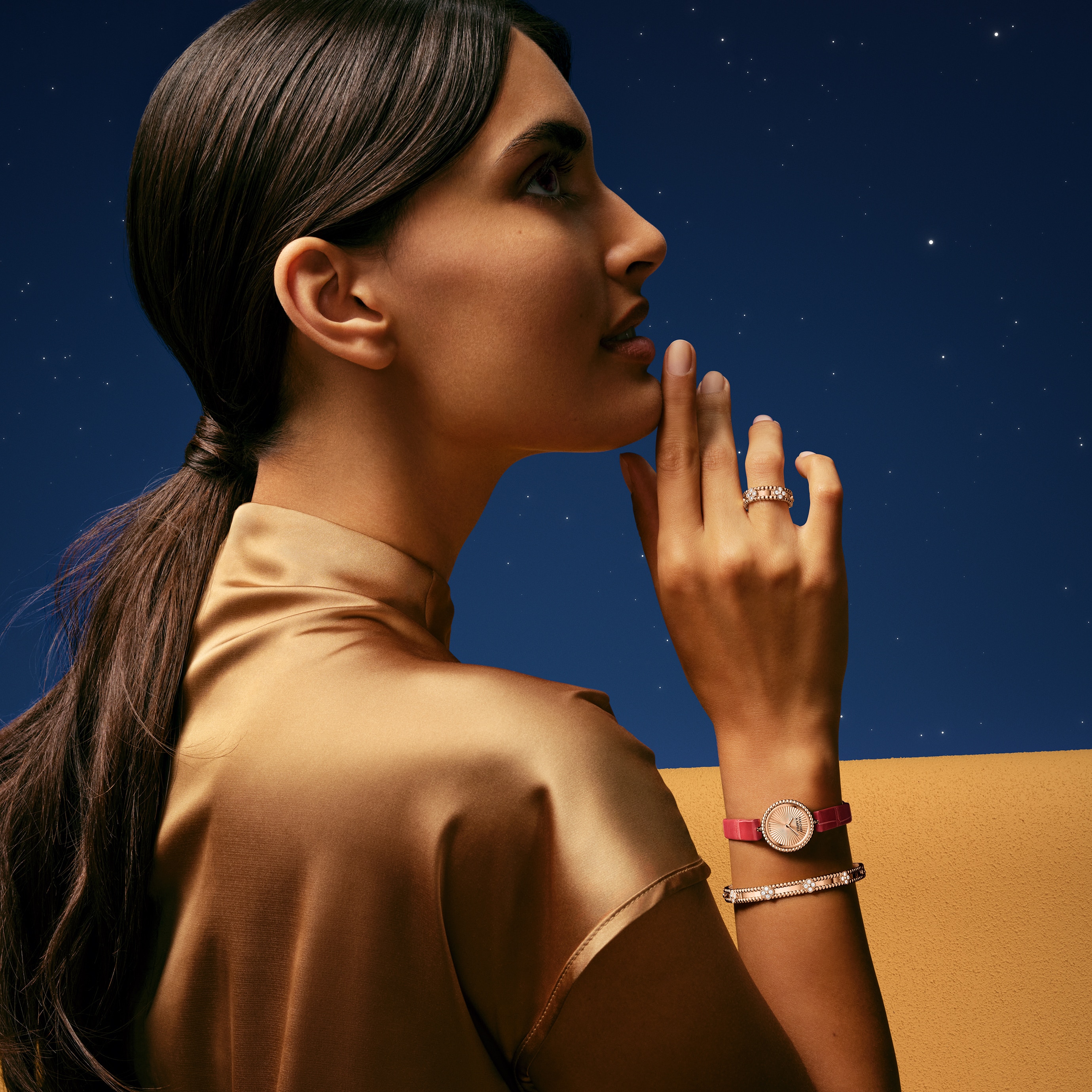 Perlée sweet clovers ring and bracelet, 18K rose gold, diamonds.  Perlée watch, 23 mm, 18K rose gold, guilloché 18K rose gold, Swiss quartz movement. Perlée collection, Van Cleef & Arpels.