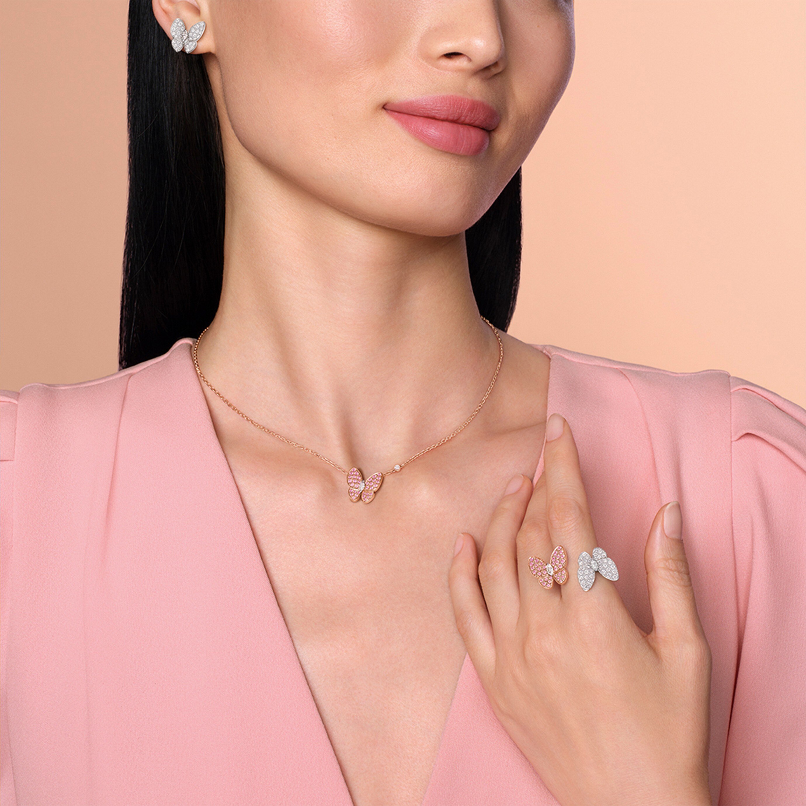 Two Butterfly pendant, Between the Finger™ ring and earrings, 18K white gold, 18K rose gold, pink sapphires, diamonds.Two Butterfly collection, Van Cleef & Arpels.