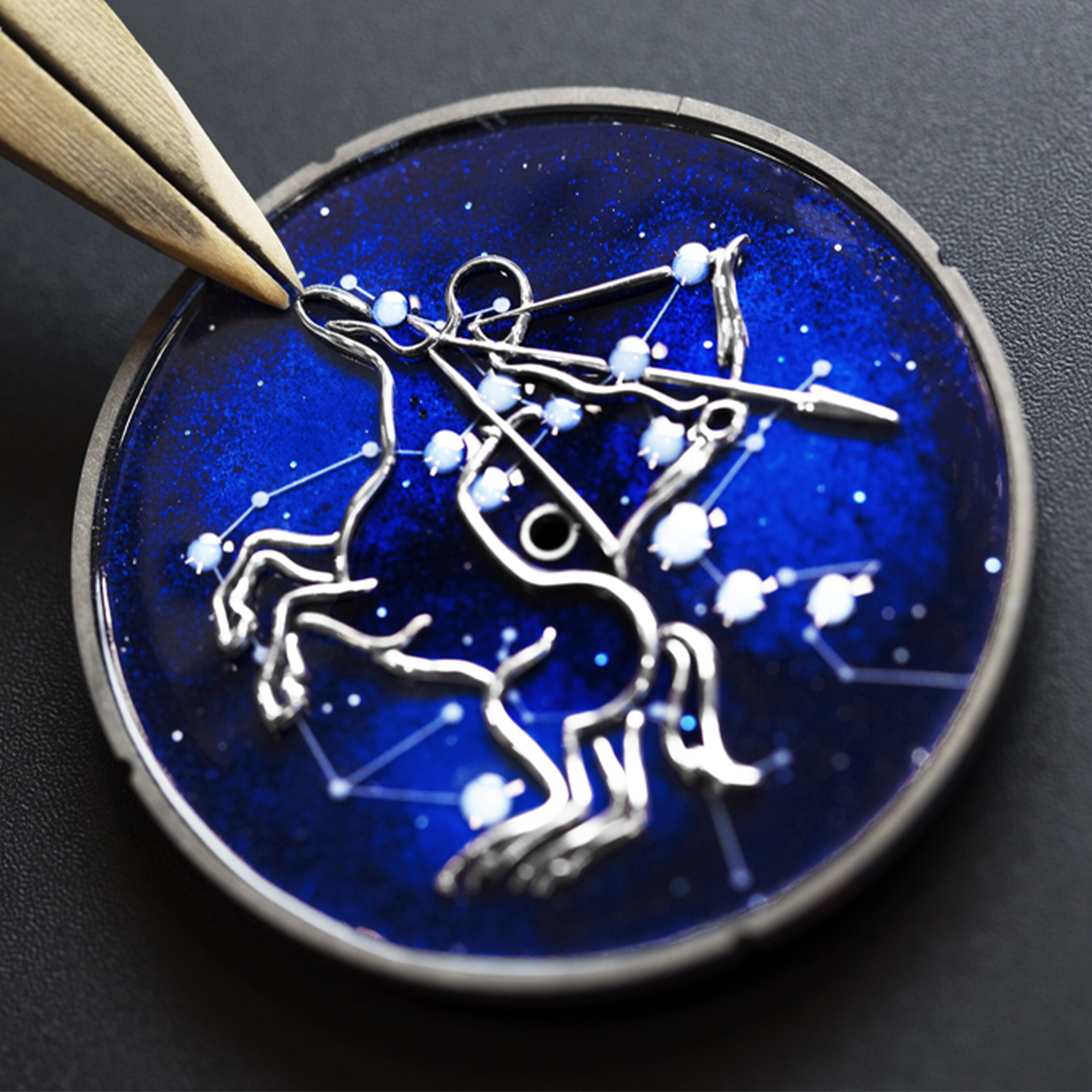 Midnight Zodiaque Lumineux Sagittarii (Sagittarius) watch, assembling the dial. Zodiaque collection, Van Cleef & Arpels.