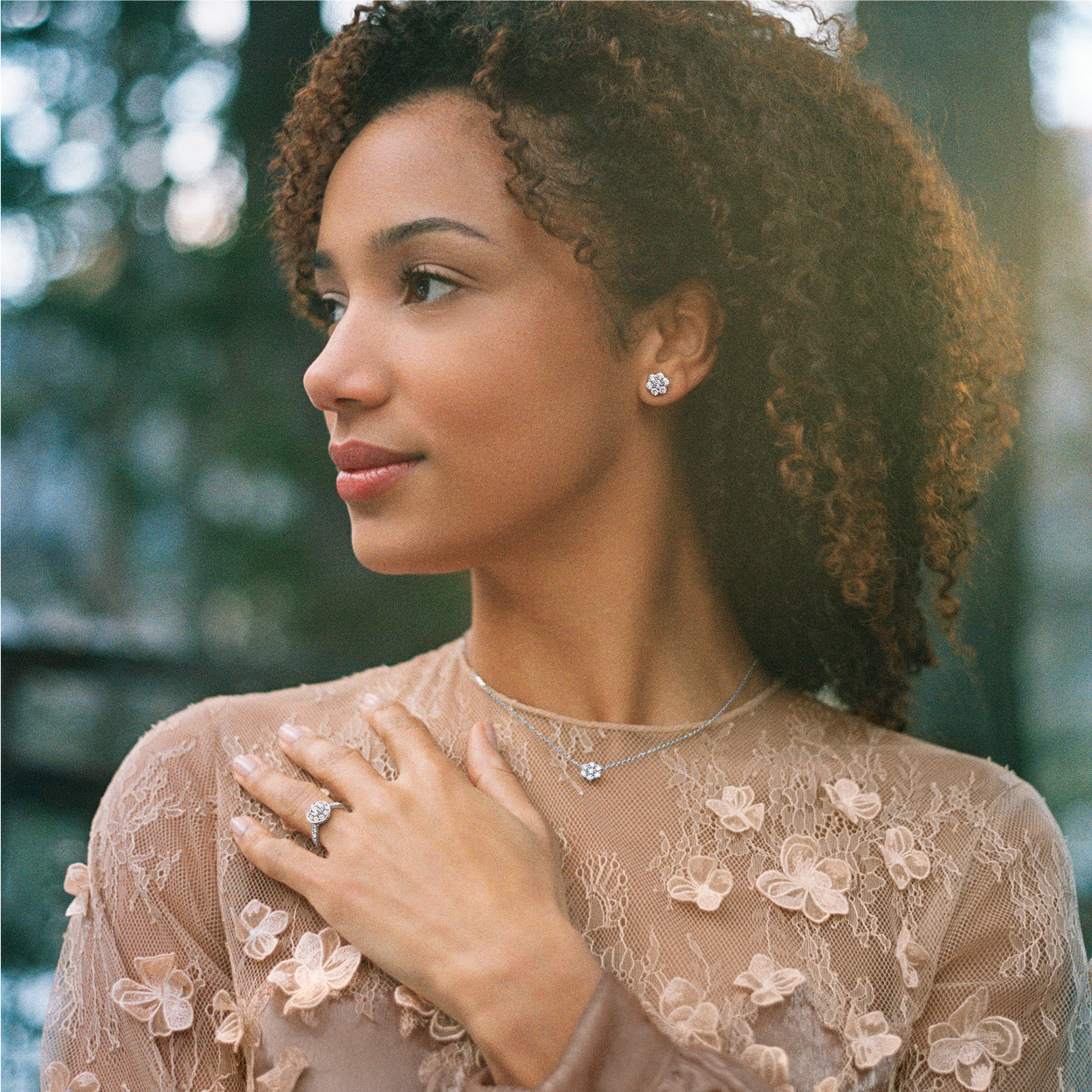 Fleurette earstuds and pendant, white gold, diamonds. Icône solitaire, platinum and diamonds. Van Cleef & Arpels