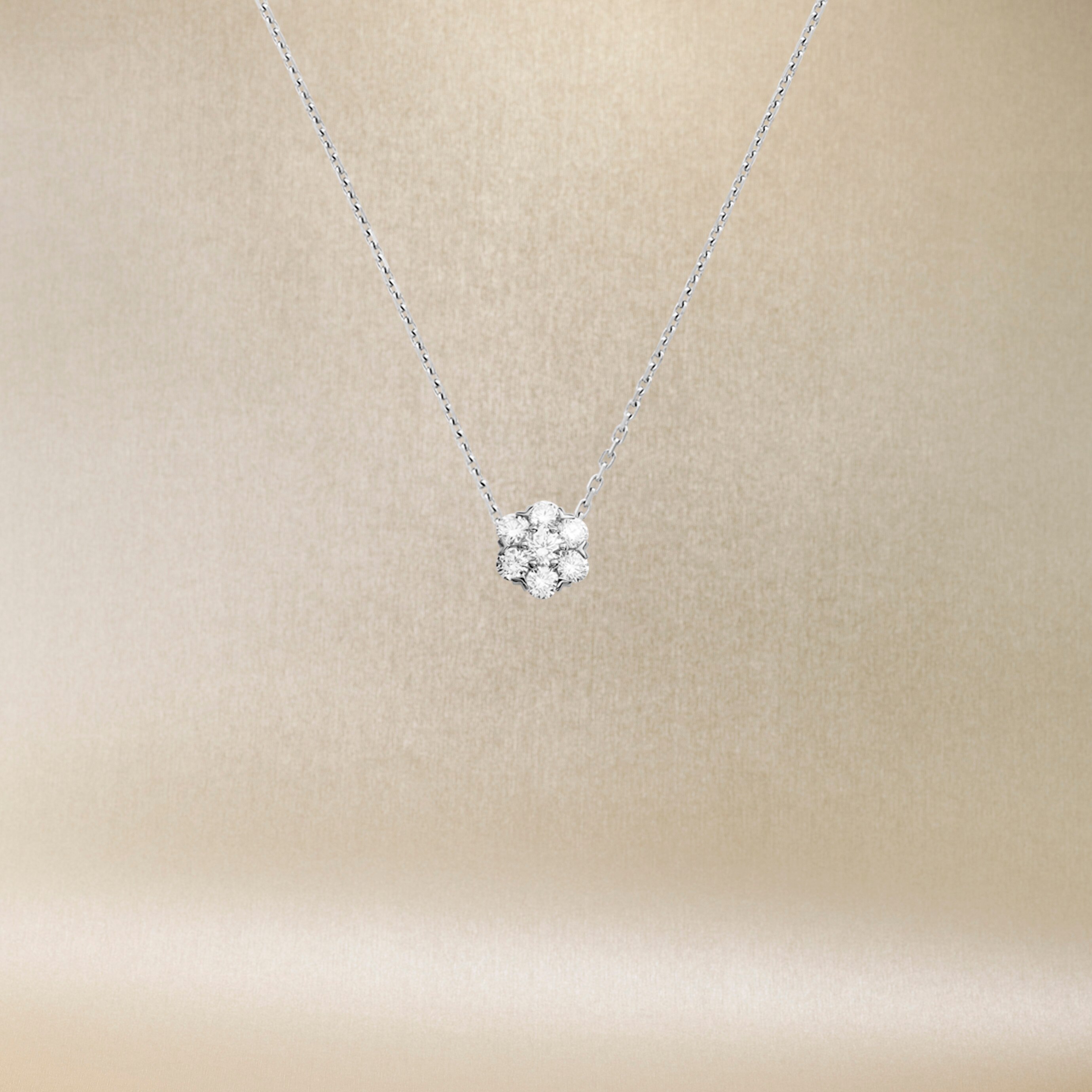 Fleurette pendant, white gold and diamonds. Fleurette collection, Van Cleef & Arpels