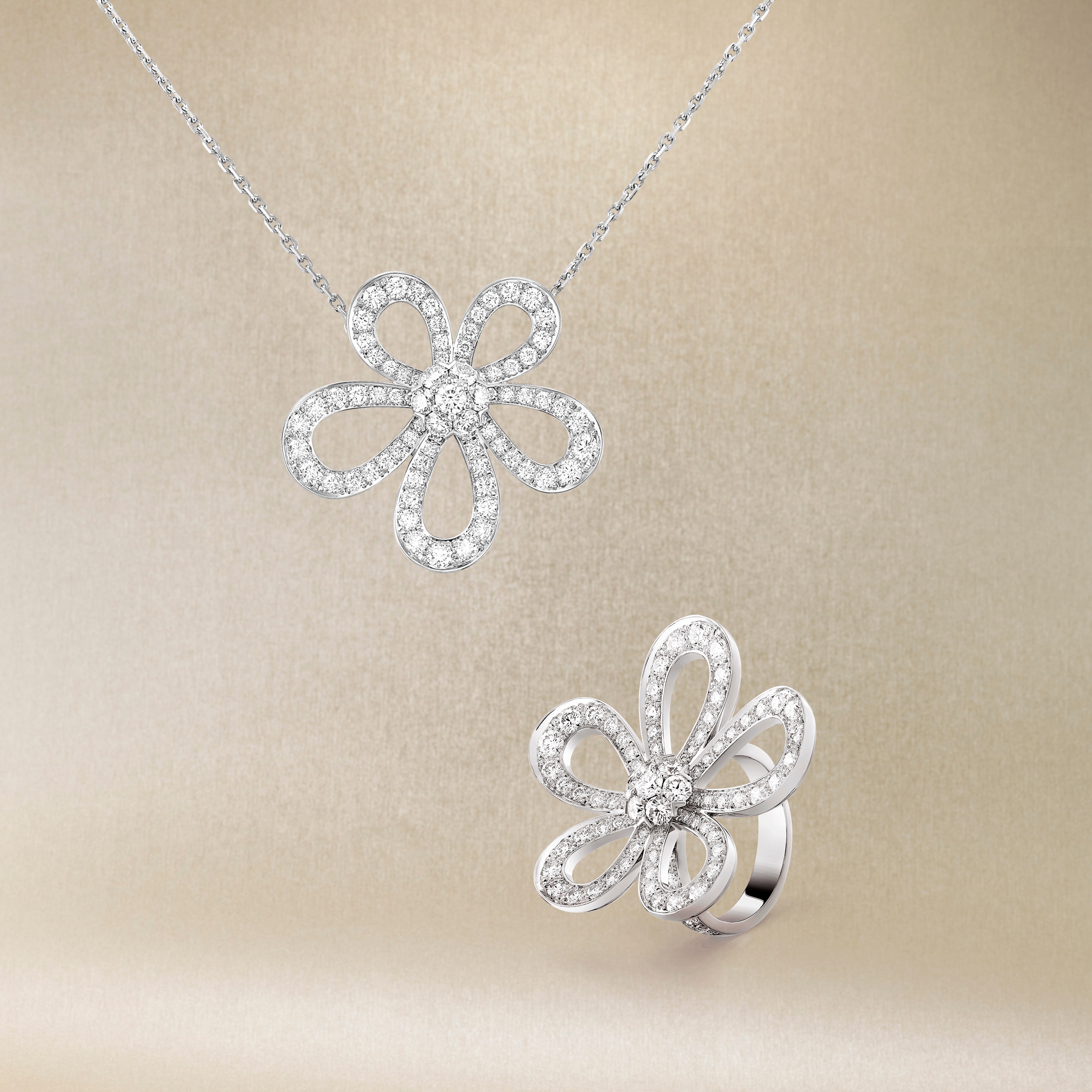 Flowerlace pendant, white gold and diamonds. Fleurette collection, Van Cleef & Arpels