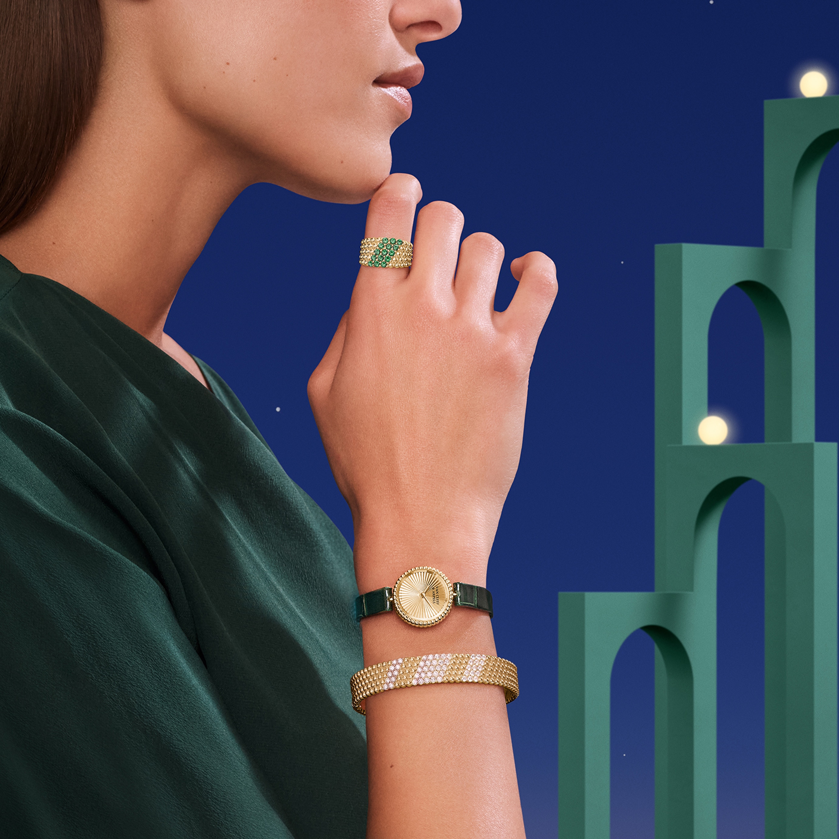 Perlée® watch, 23 mm, 18K yellow gold, guilloché 18K yellow gold, Swiss quartz movement. Perlée® couleurs ring, 5 rows, 18K yellow gold, emeralds. Perlée® diamonds bracelet, 5 rows, 18K yellow gold, diamonds. Perlée® collection, Van Cleef & Arpels.