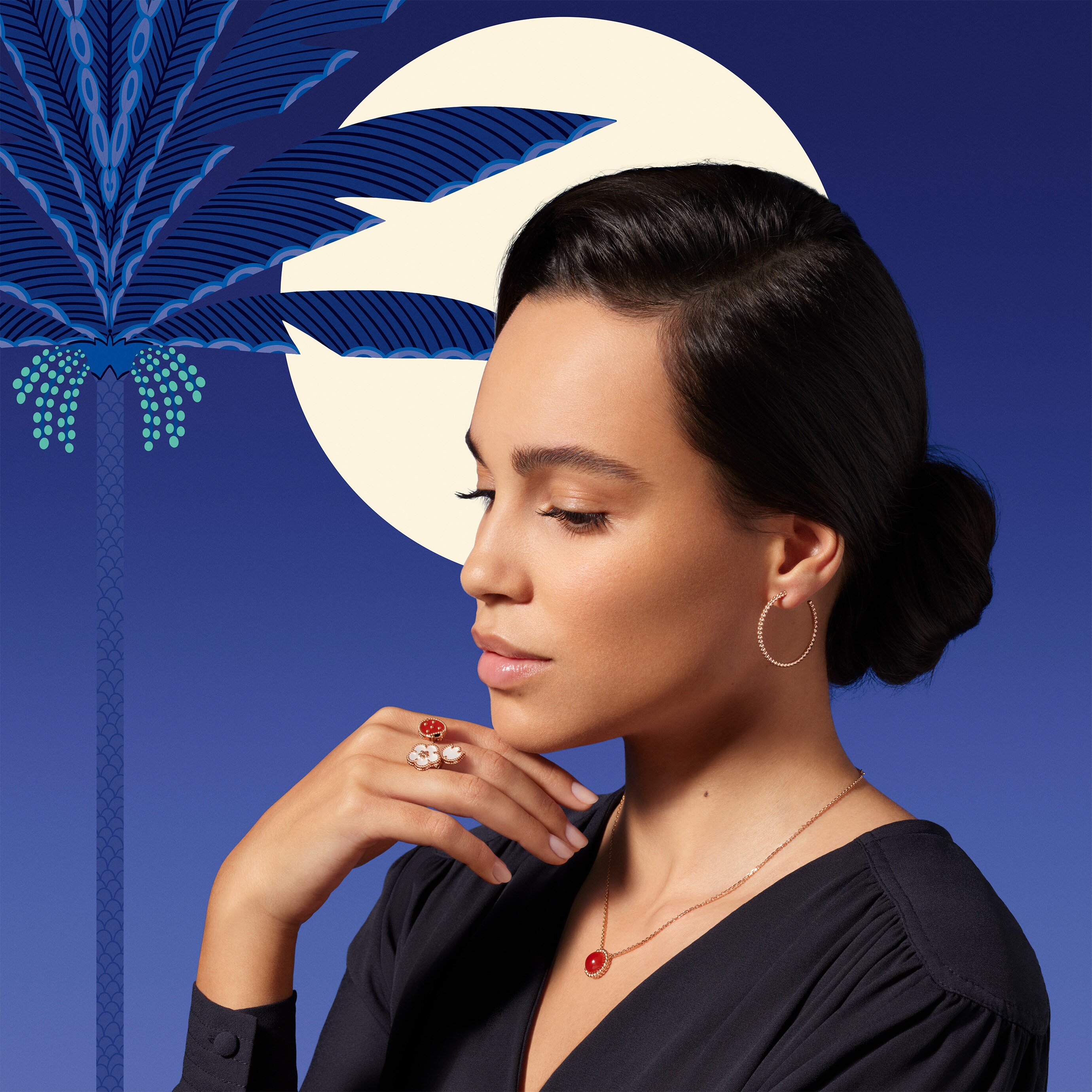 Perlée pearls of gold hoop earrings, 18K rose gold and Perlée couleurs pendant, 18K rose gold, carnelian.  Lucky Spring Between the Finger ring, 18K rose gold, white mother-of-pearl, carnelian, onyx. Perlée and Lucky Spring collection, Van Cleef & Arpels.