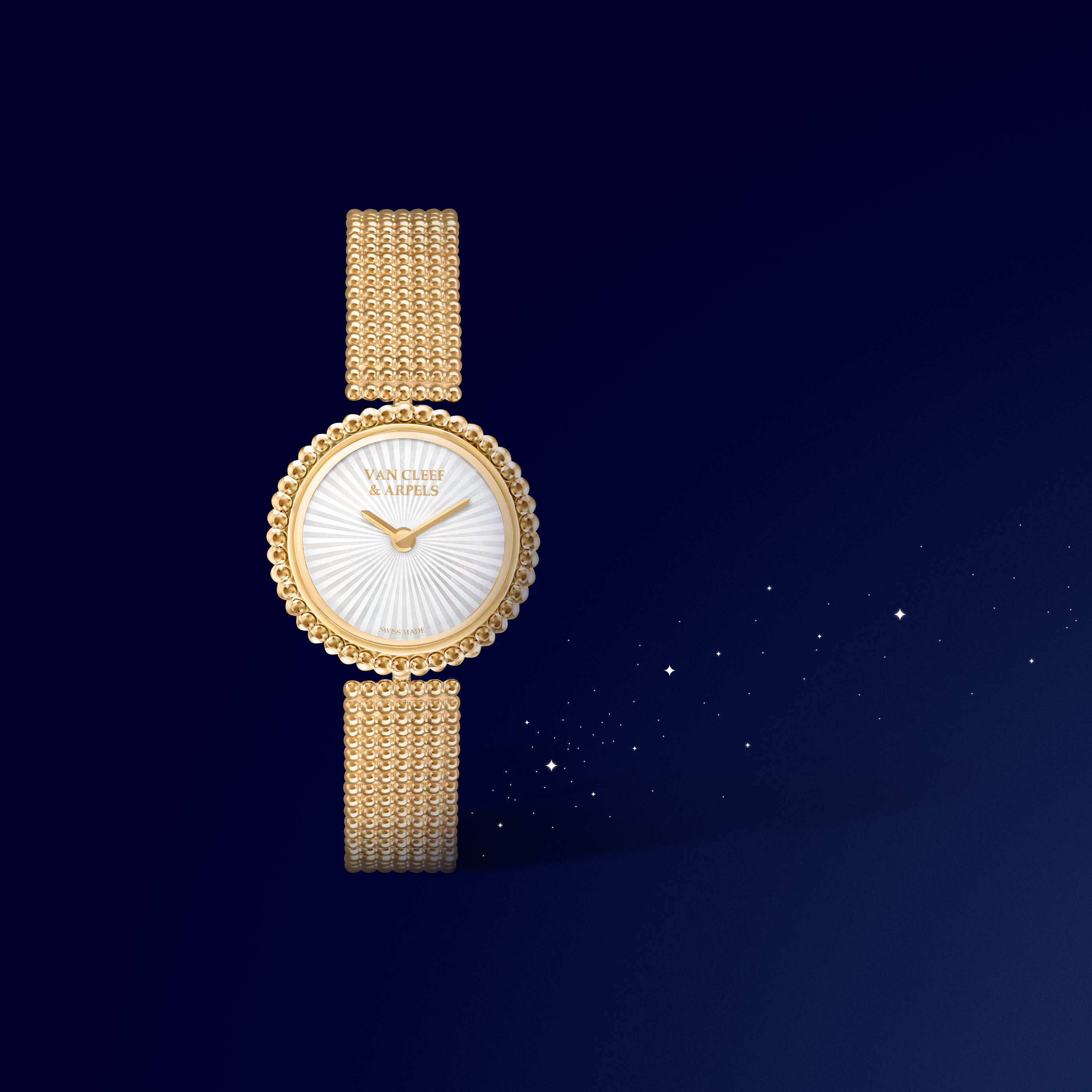 Perlée watch, 18K yellow gold, guilloché white mother-of-pearl. Perlée collection, Van Cleef & Arpels.