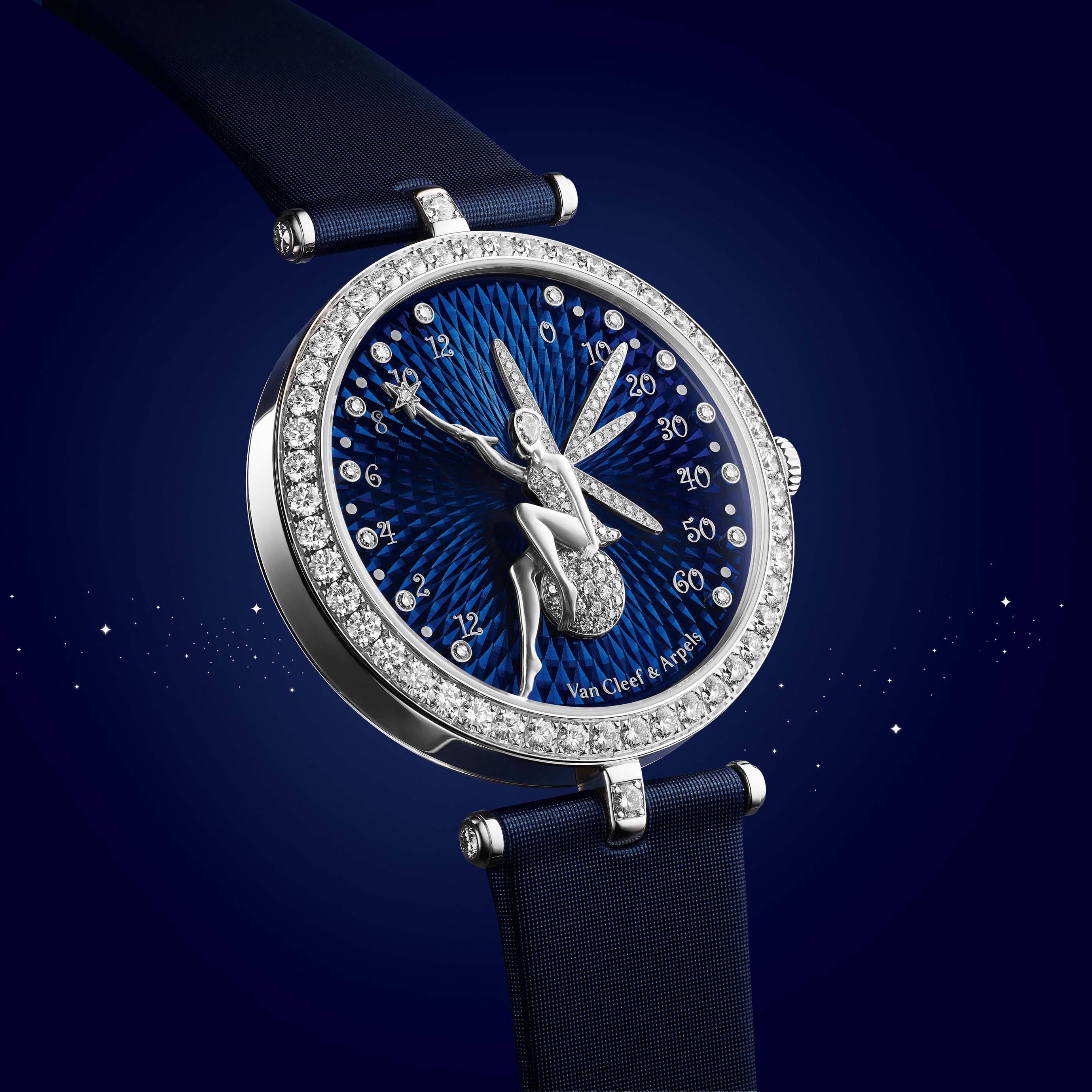 Lady Arpels Féerie Watch, 18K white gold, round diamonds, guilloché blue enamel dial, sculpted 18K white gold fairy with round and pear-shaped diamonds. Poetic Complications collection, Van Cleef & Arpels.